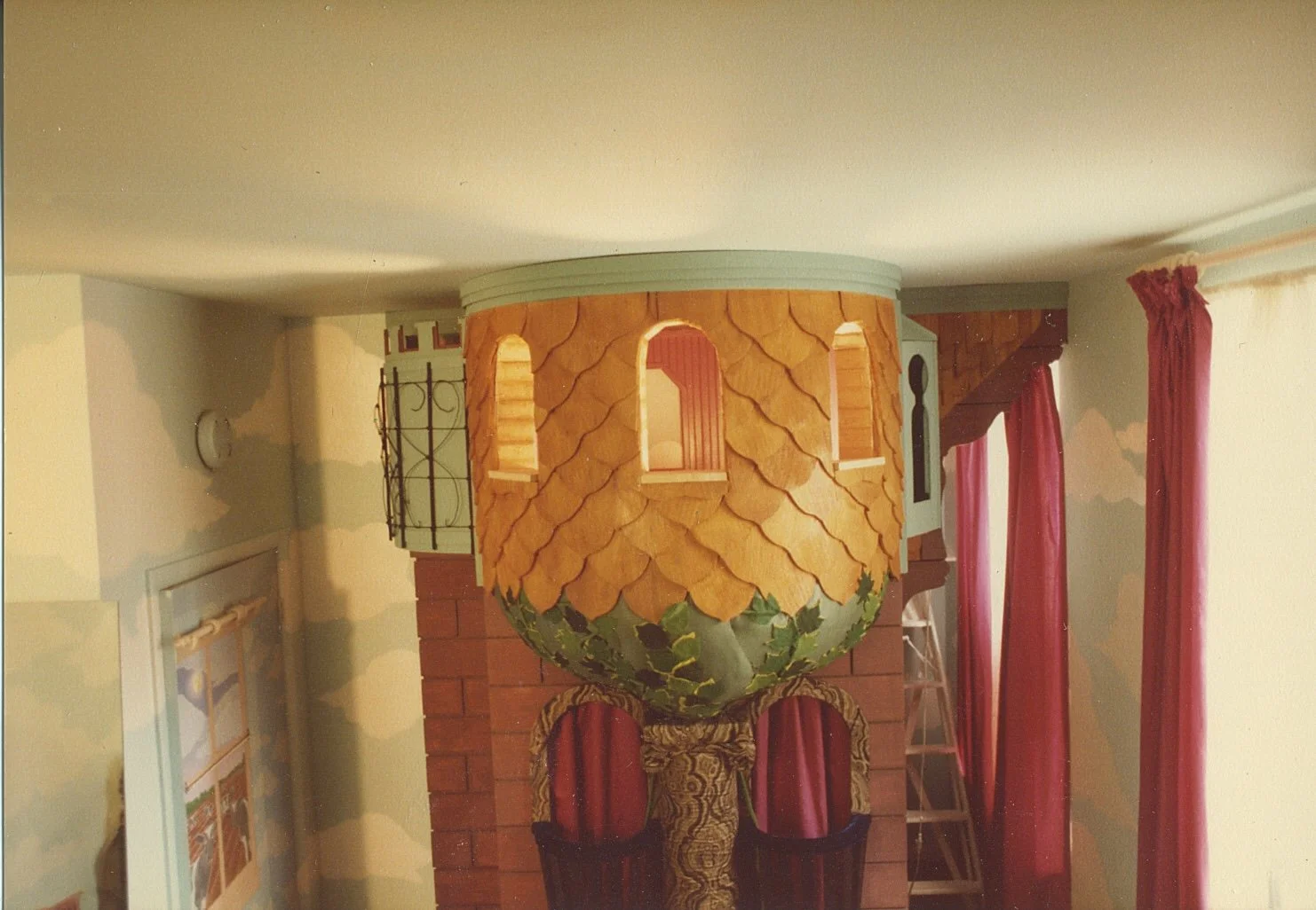 A friend painted the clouds on the walls and the closet door