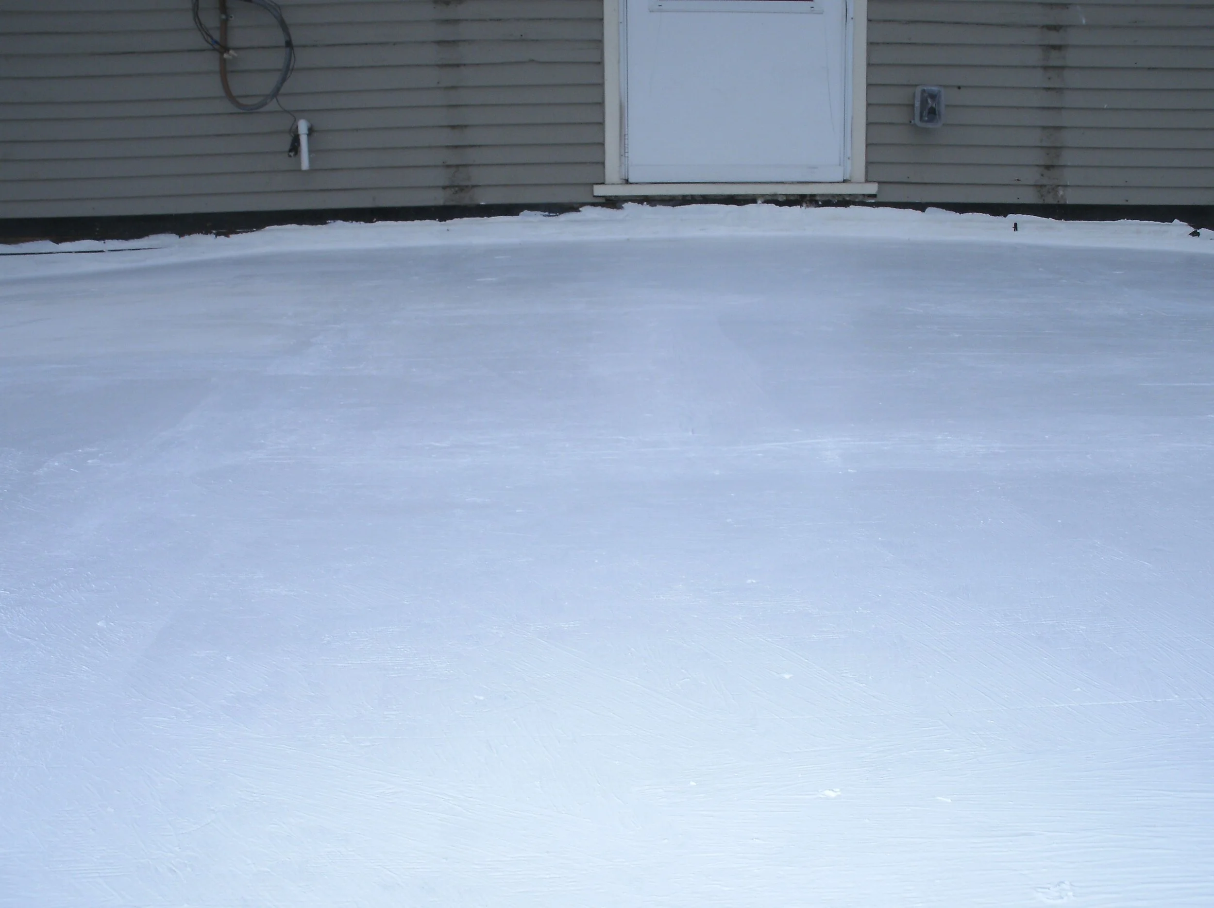 Plywood with seams caulked and sealed and 3 coats of mobile home roof coating paint