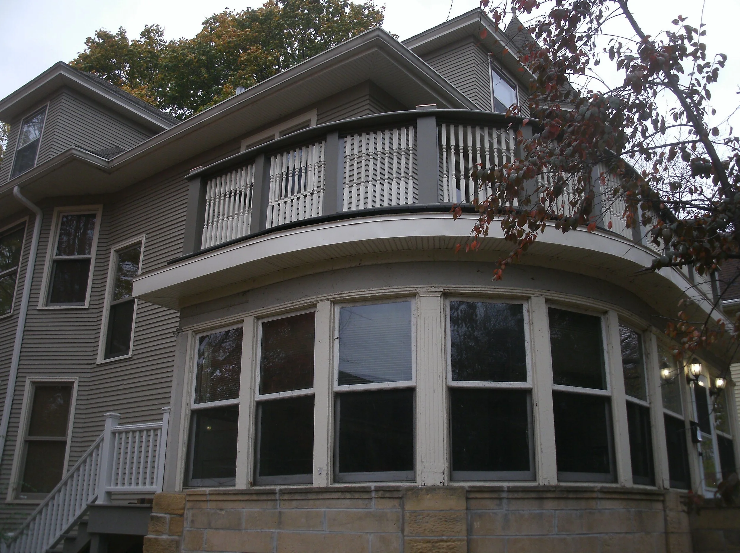 View from the ground of the beautiful curved railing top.