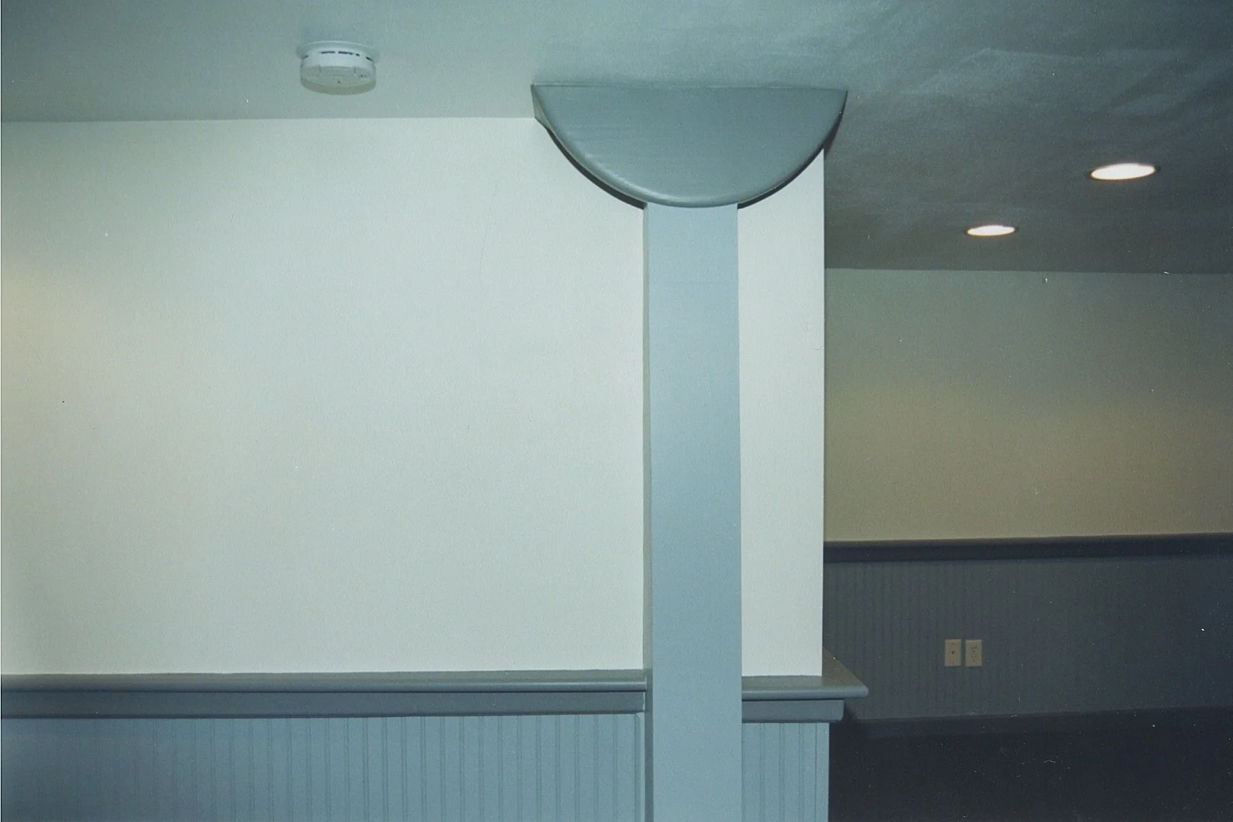 Close-up of whimsical custom support beam cladding