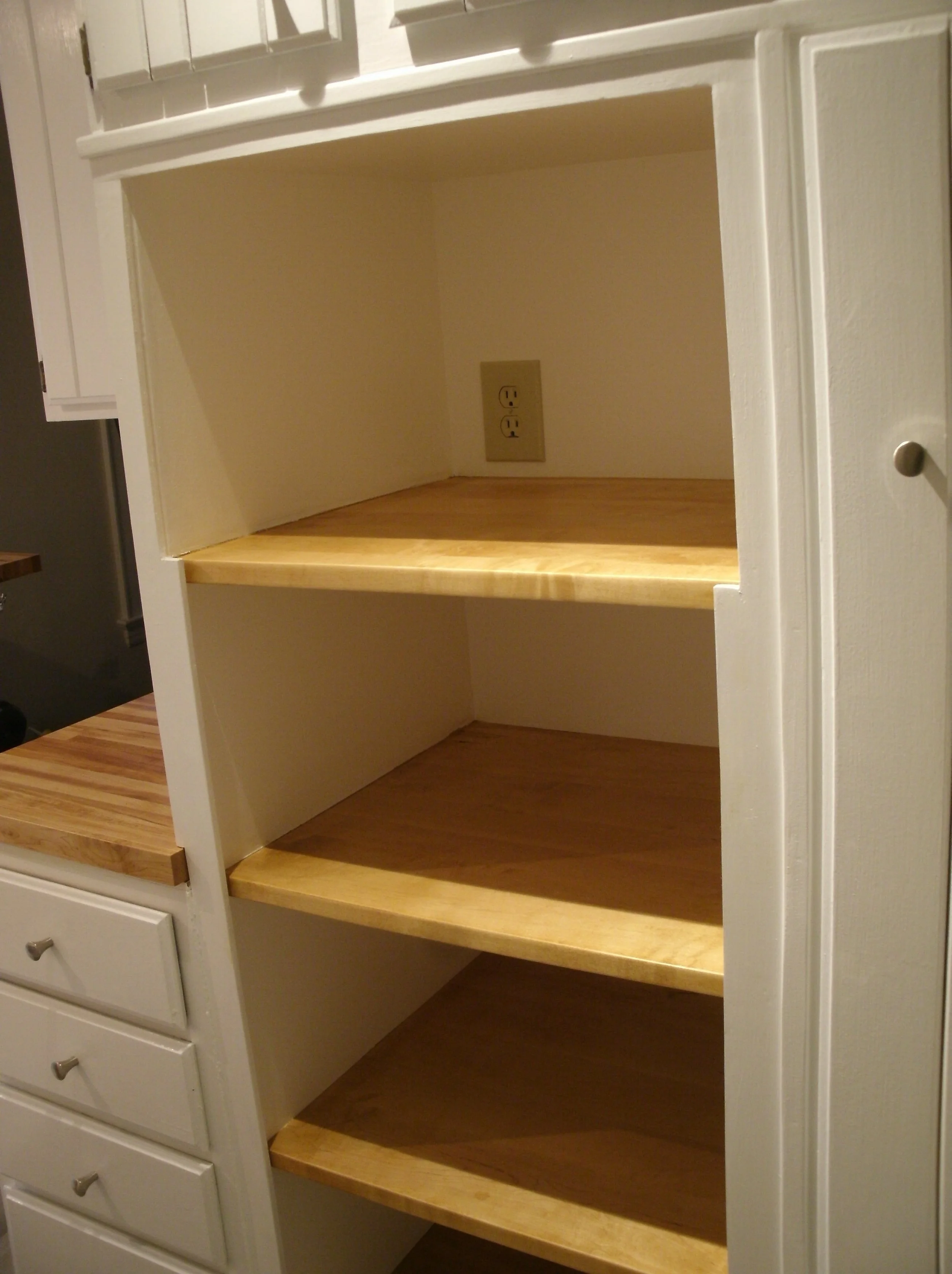 Close up of three new shelves