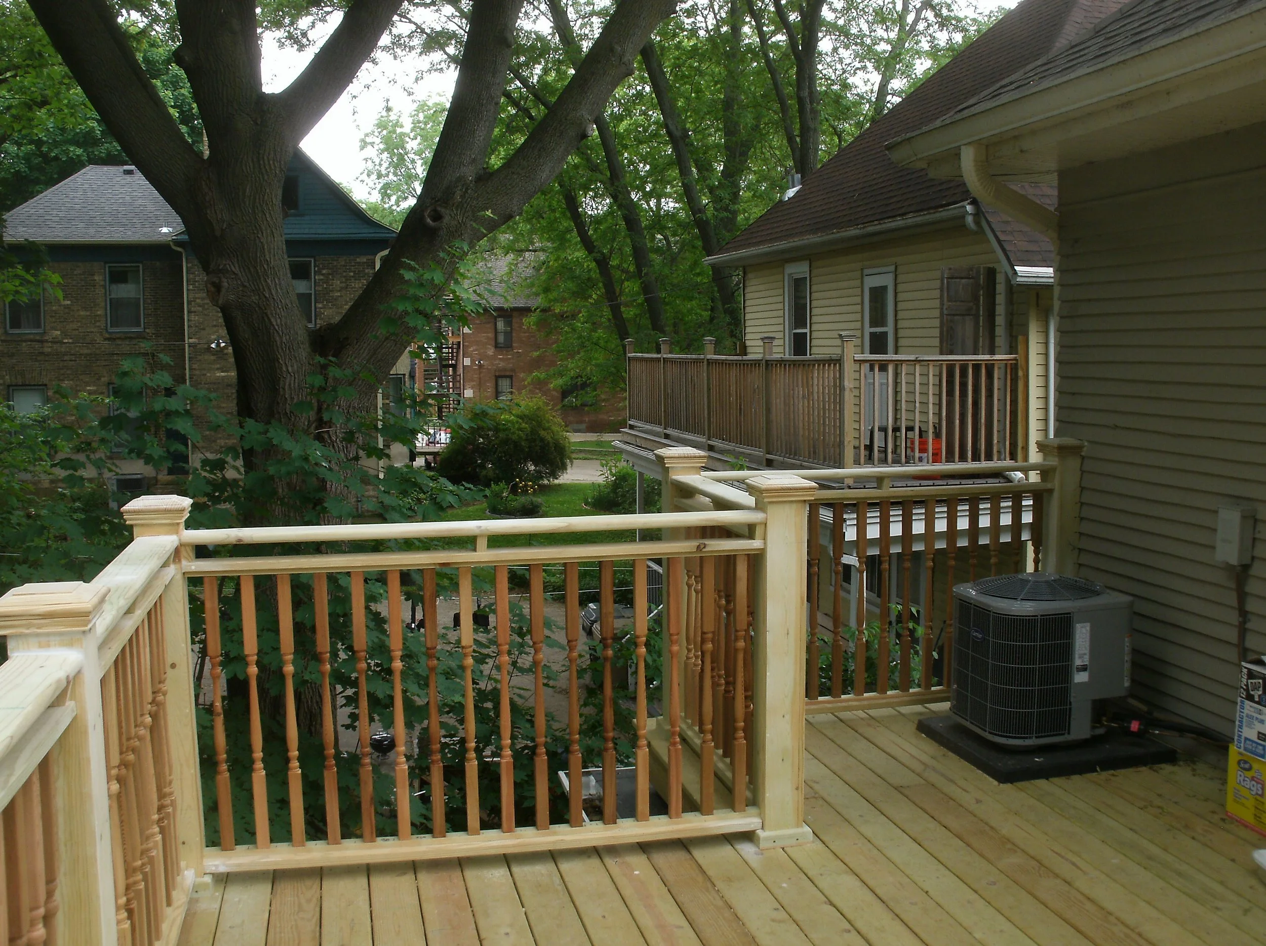 Another view of the unpainted rails with air-conditioning unit reinstalled.