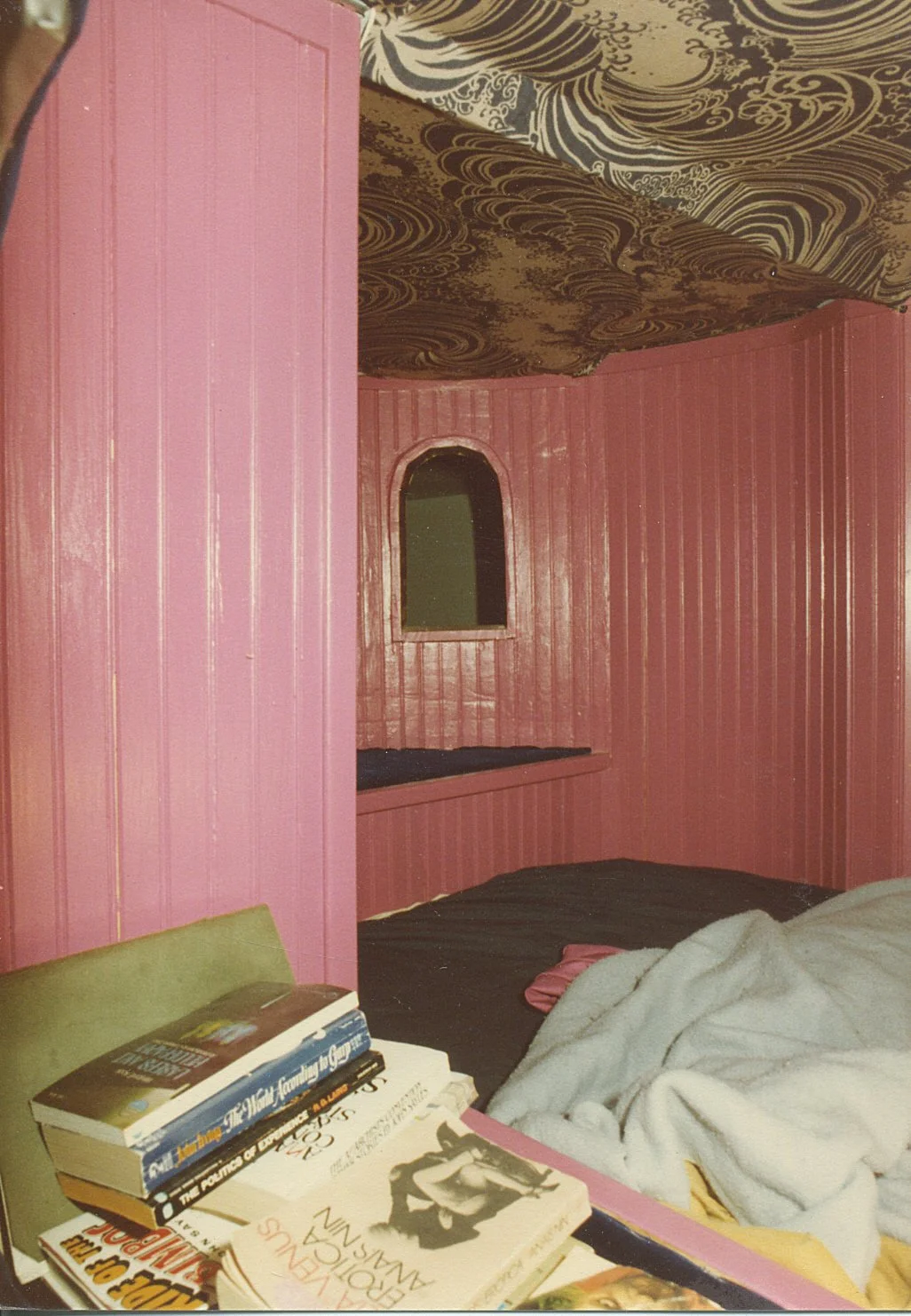 The bed walls installed and wave pattern fabric on the ceiling