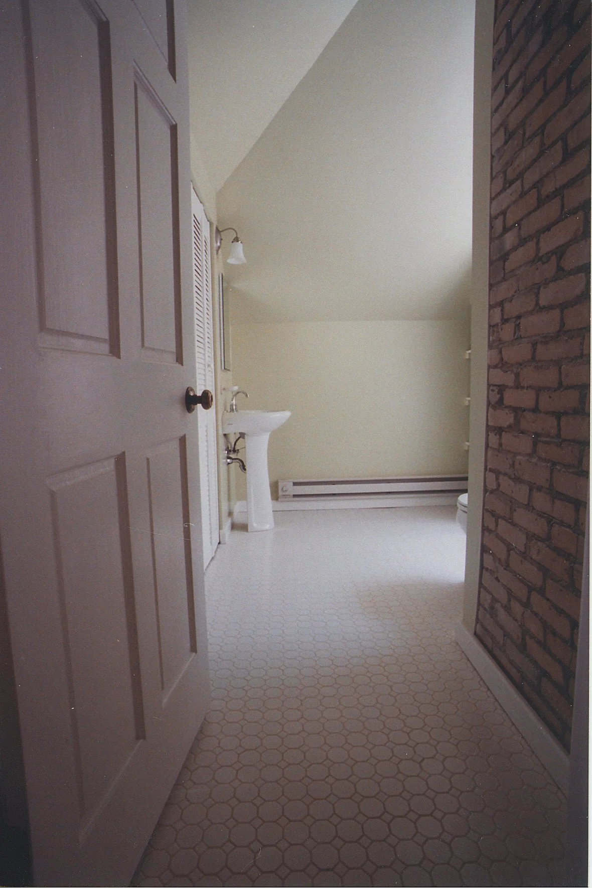 Tub siting was constrained by skylight and attic framing details.