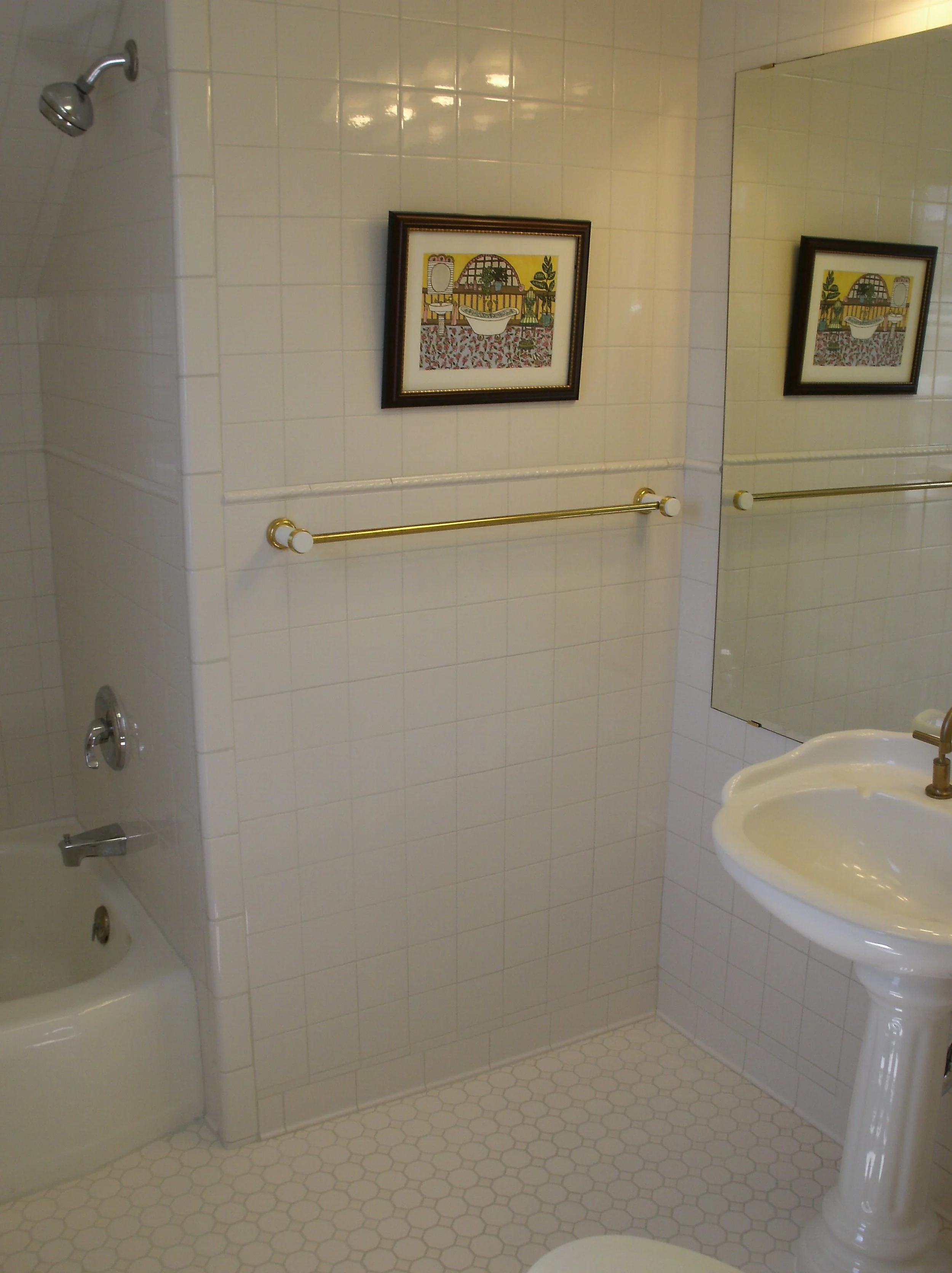 View of the opposite wall with a hint of the shower/tub