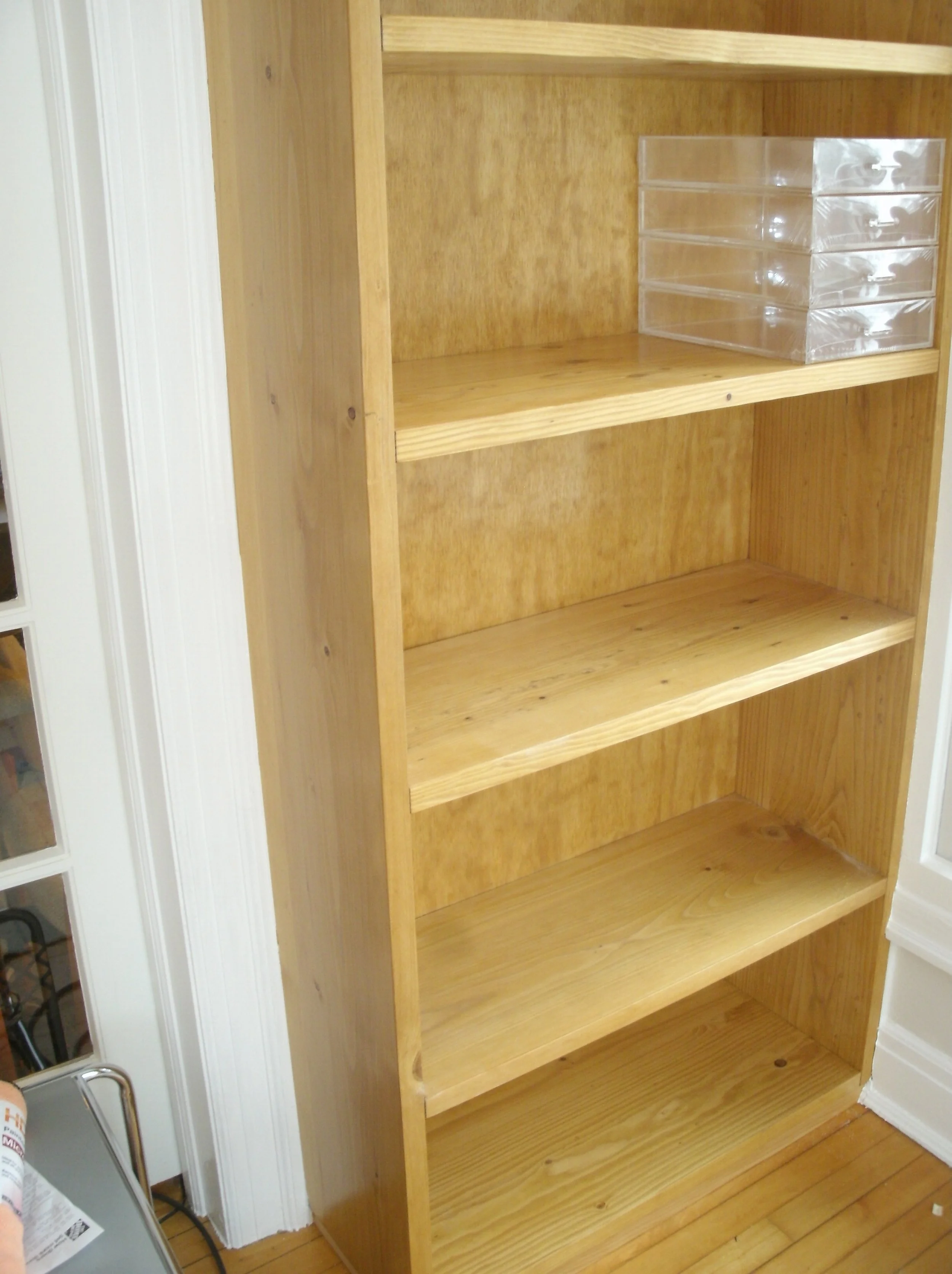 One of the two freestanding shelf units