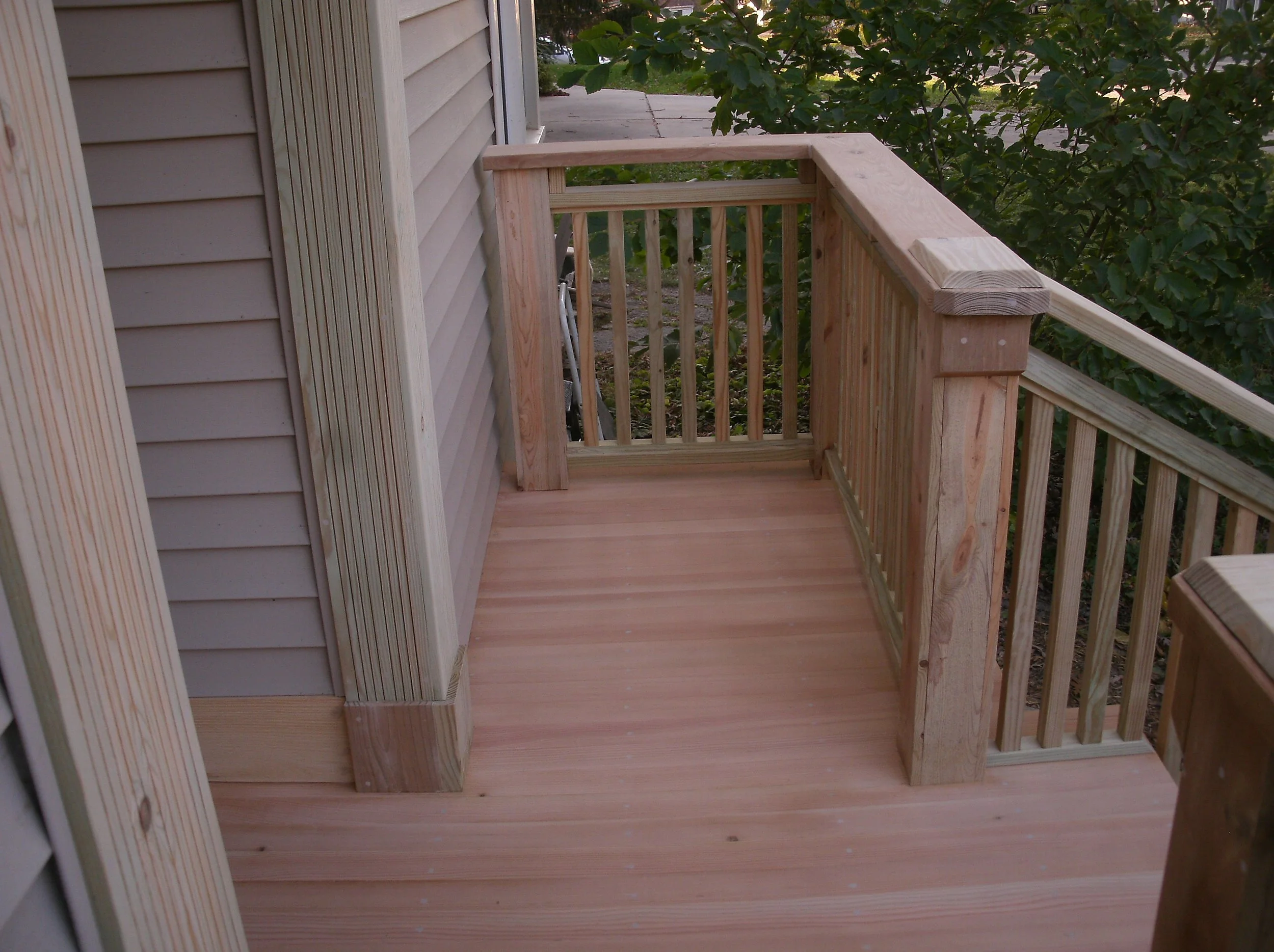 The view of the column trim with rails and decking installed