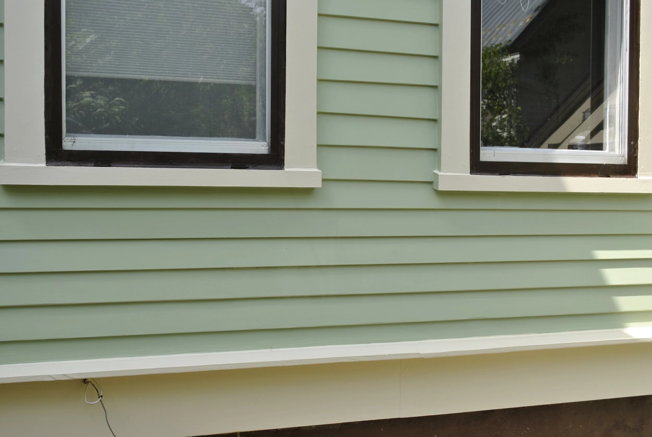 View of the two windowsill complete rebuild. All wood sells and casing had to be fabricated specially because it is all thicker than 2x8 off the rack..