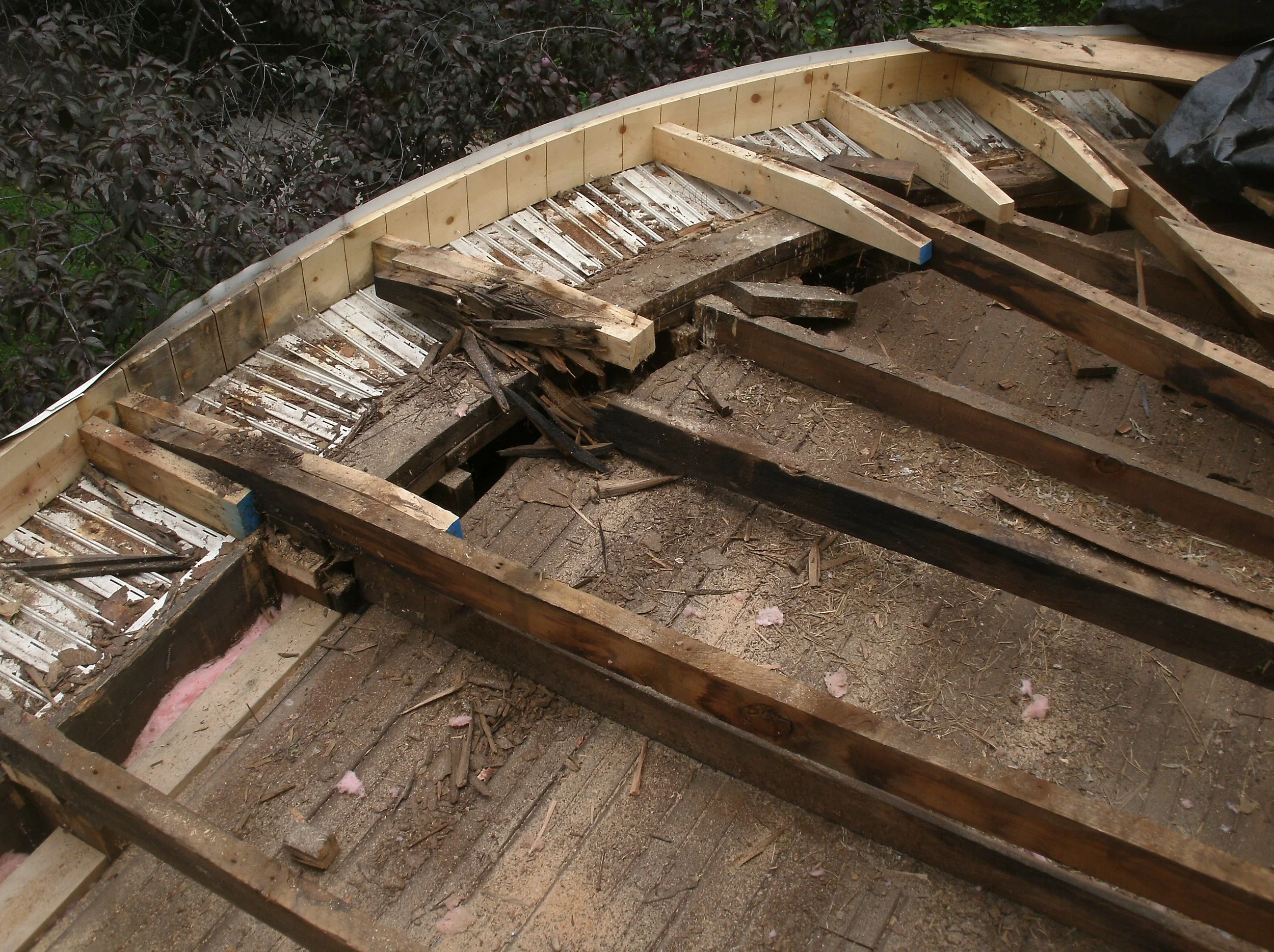 All sheathing removed. There was a soffit repair 35 years ago. I tore it all out.