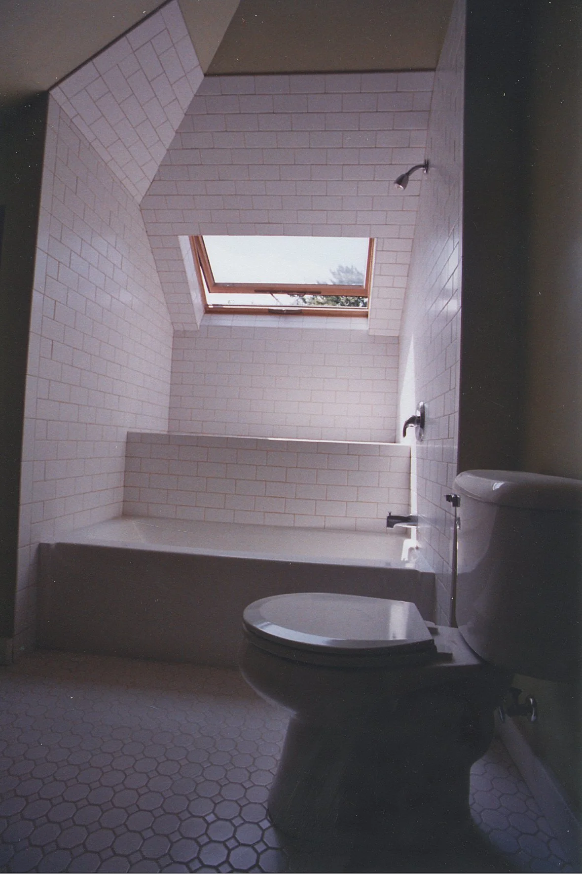 Moody lighting toilet and tub enclosure.
