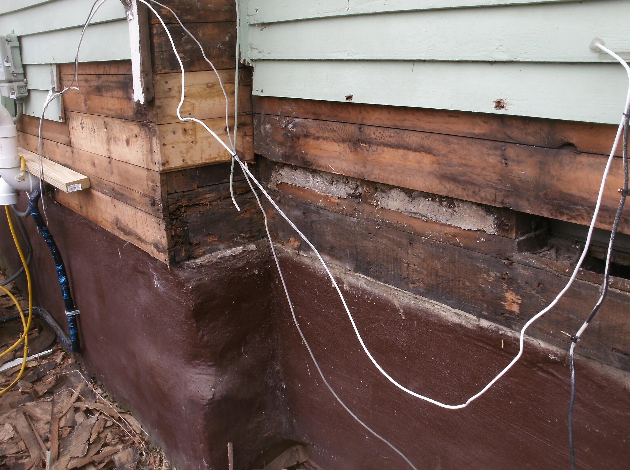 This was typical of the exposed rot and damage. Replaced insulation, sheathing.