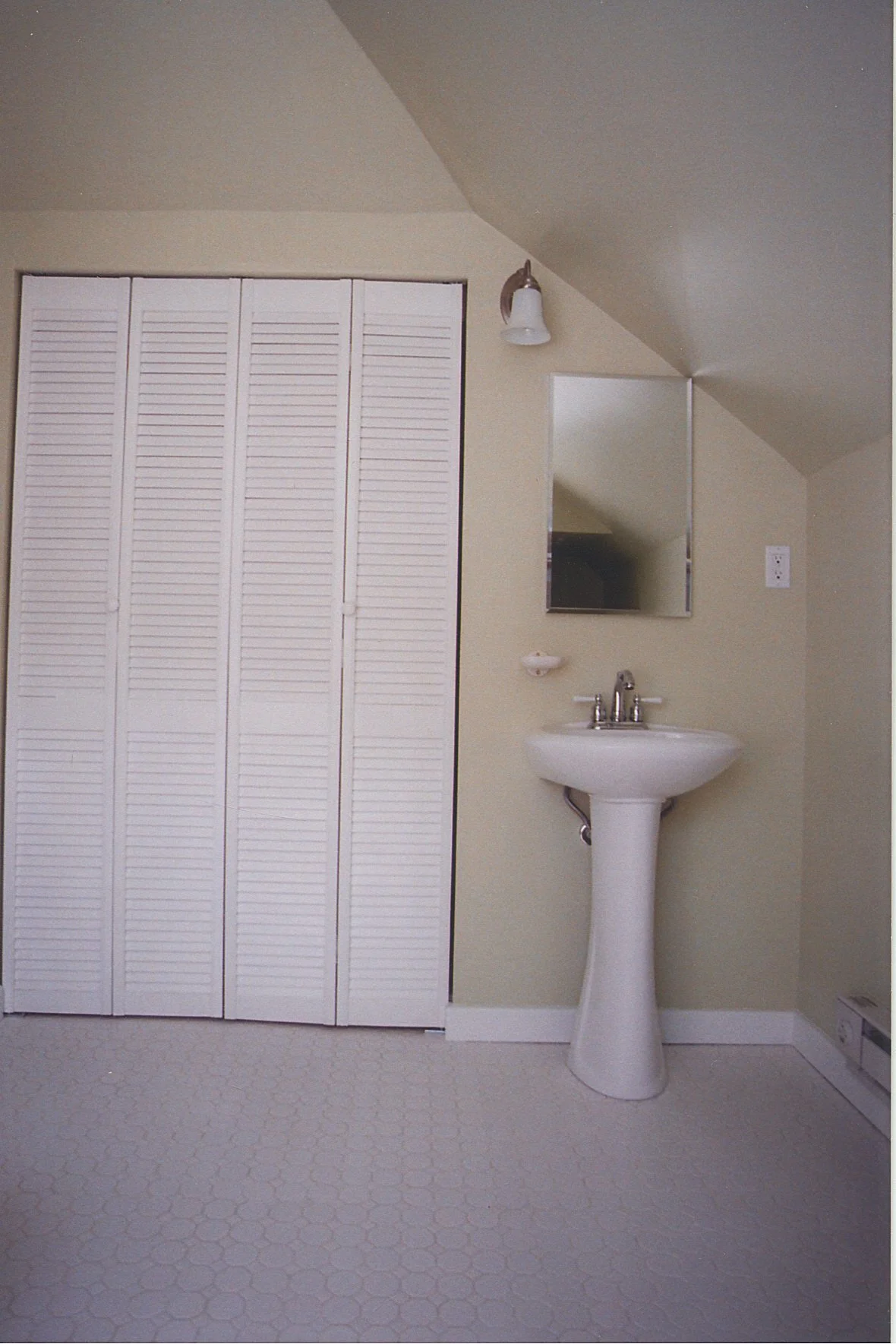 Storage closet and sink.