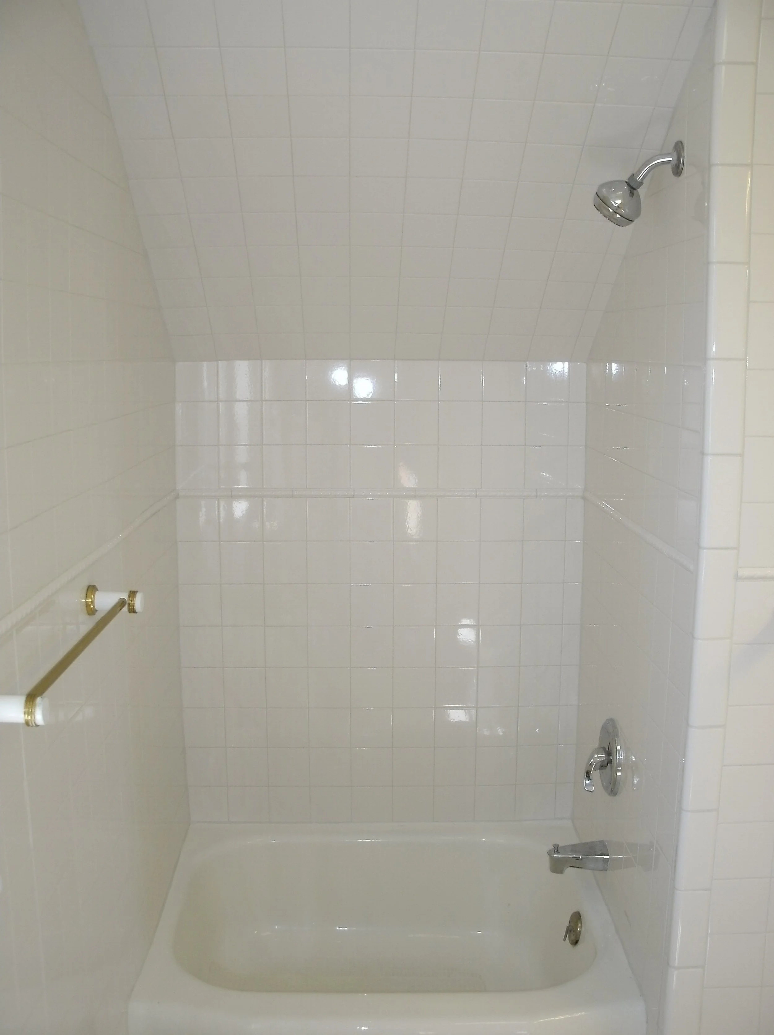 The tiny tub/shower in the dormer. I like using every bit of space.