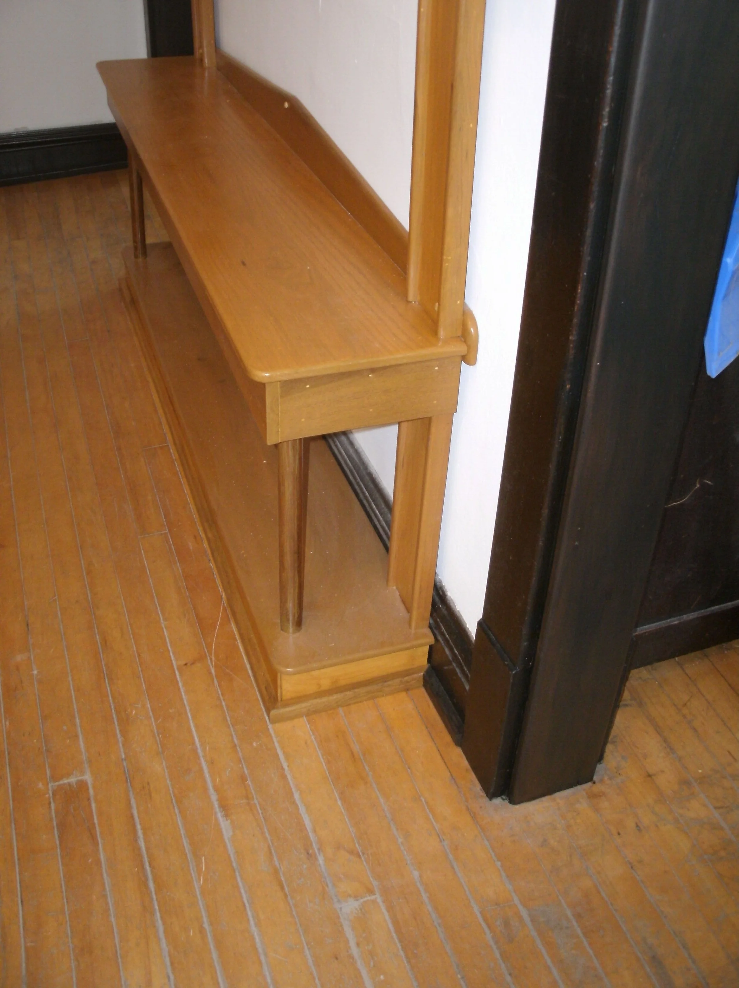 Third view of the entry hall coat and incidentals storage unit