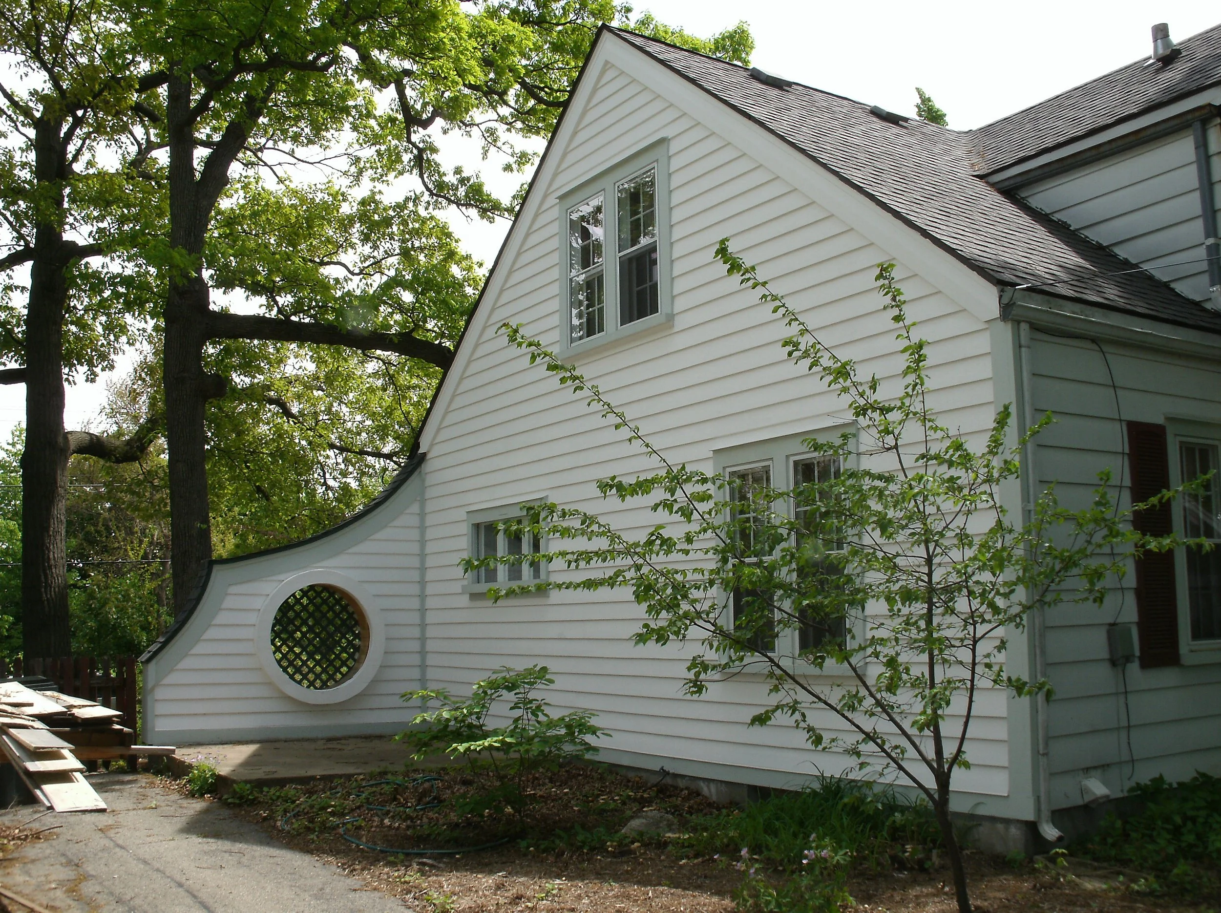 Overall View of the main job. New siding, windows, trim, wing wall, primed, and painted.