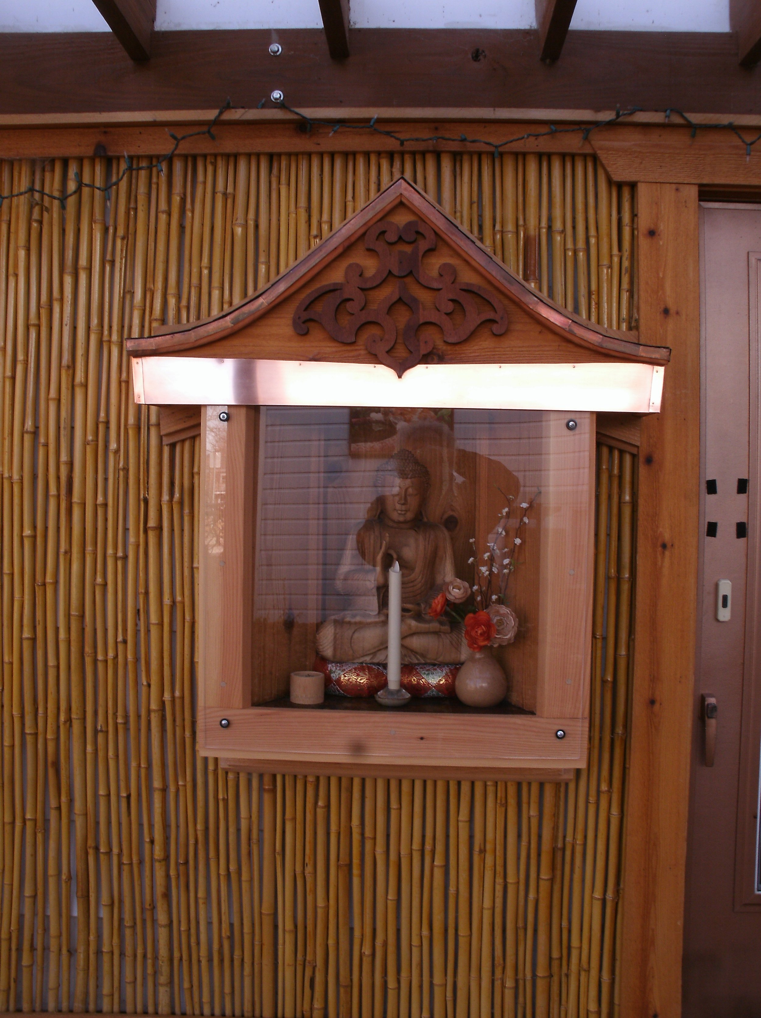 Shrine detail, esp. copper side, front facing trim, flashing, and shingles