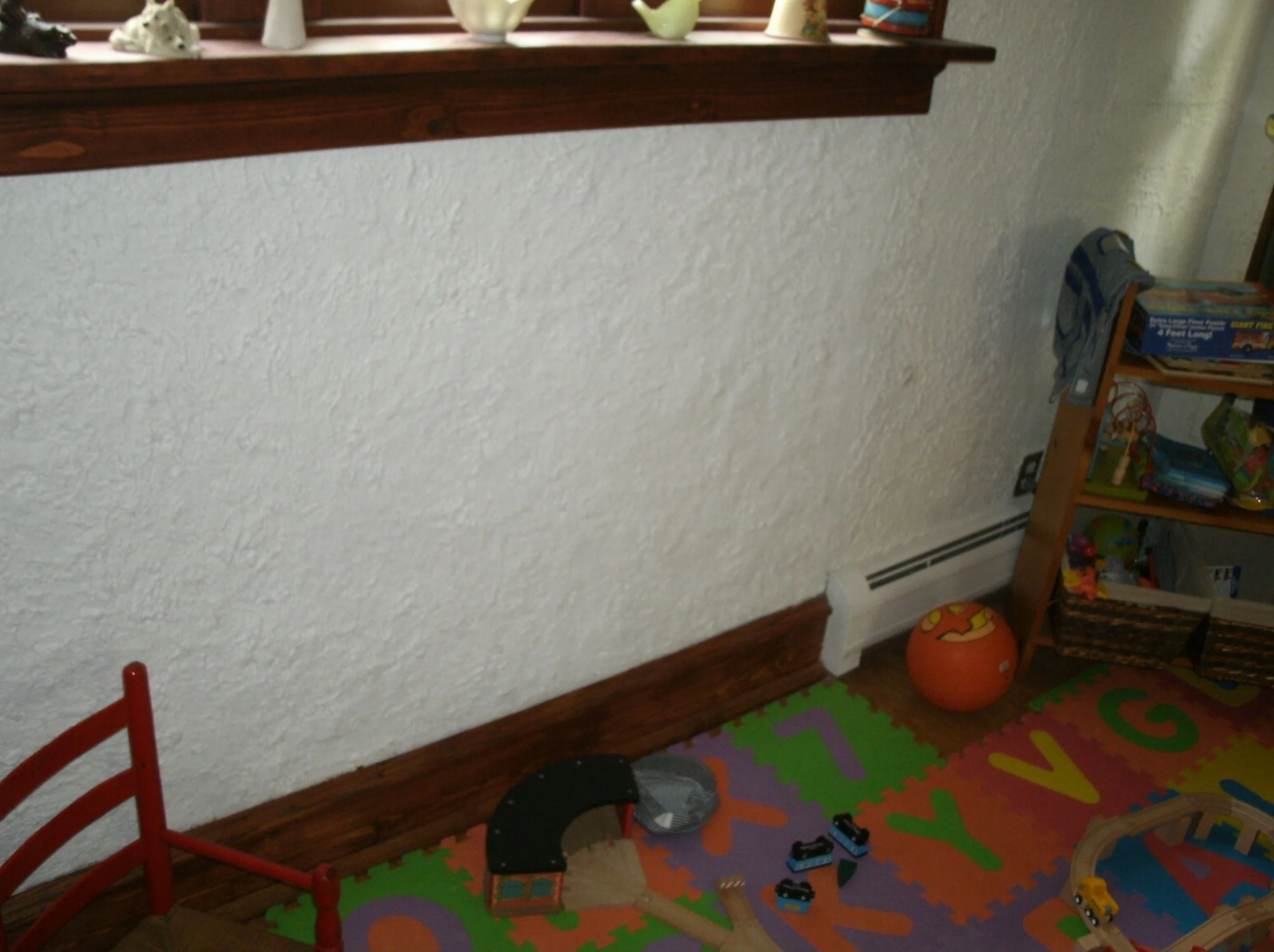 I matched the bumpy “Spanish” plaster beneath the windows. 