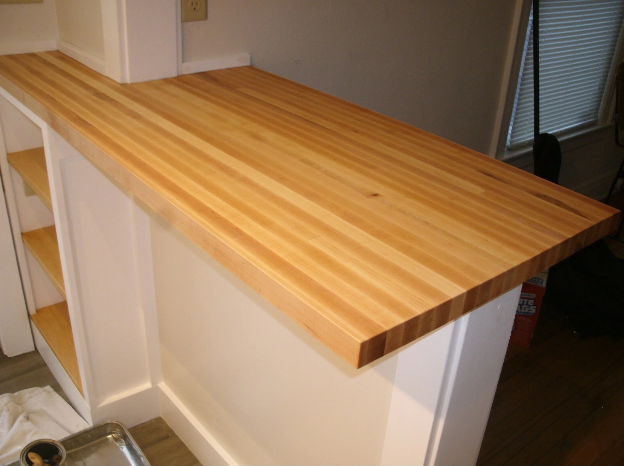 New countertop on top of a rebuilt room divider wall