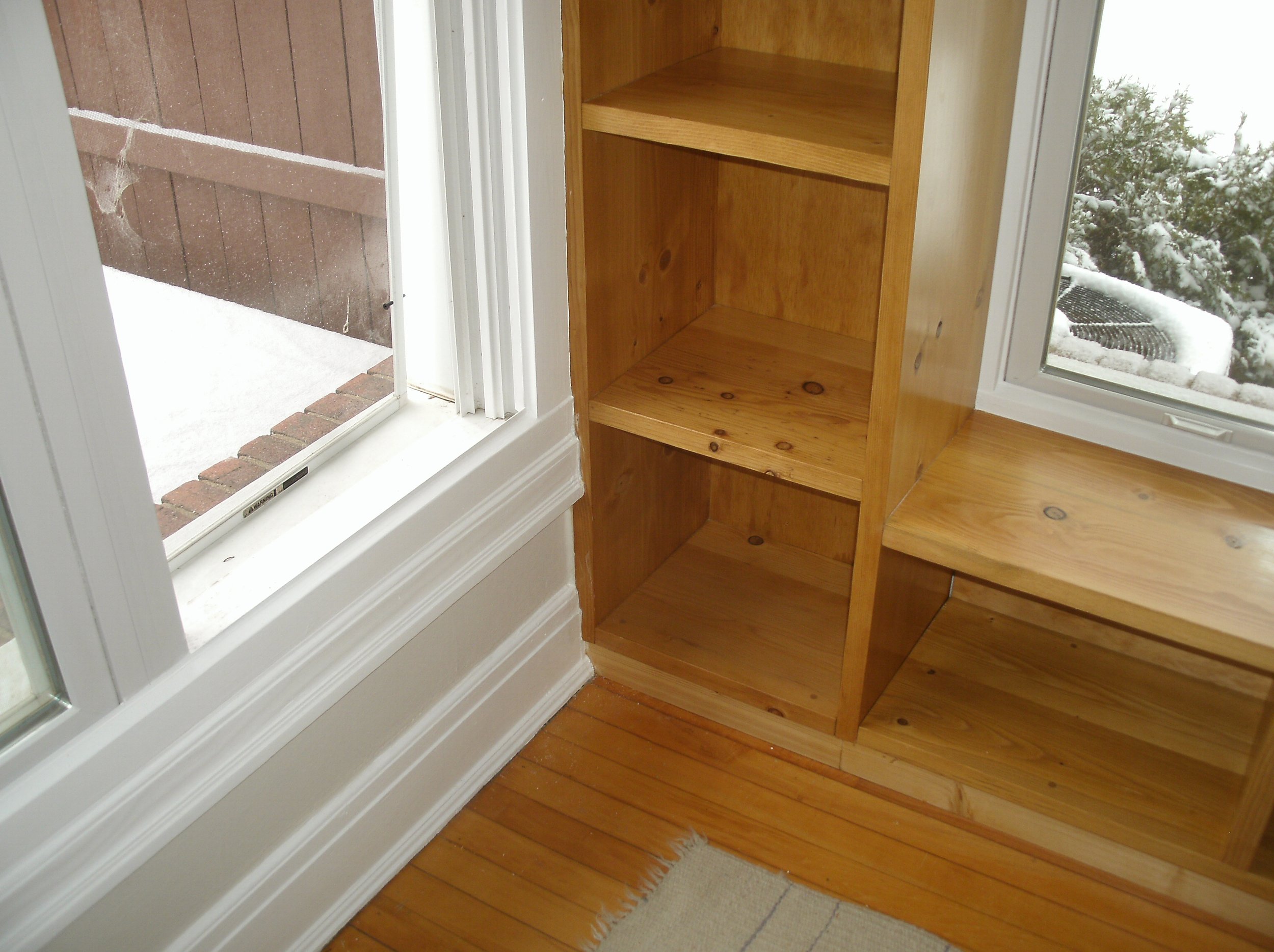 View of the bottom window trim, and how it intersected with the new shelves