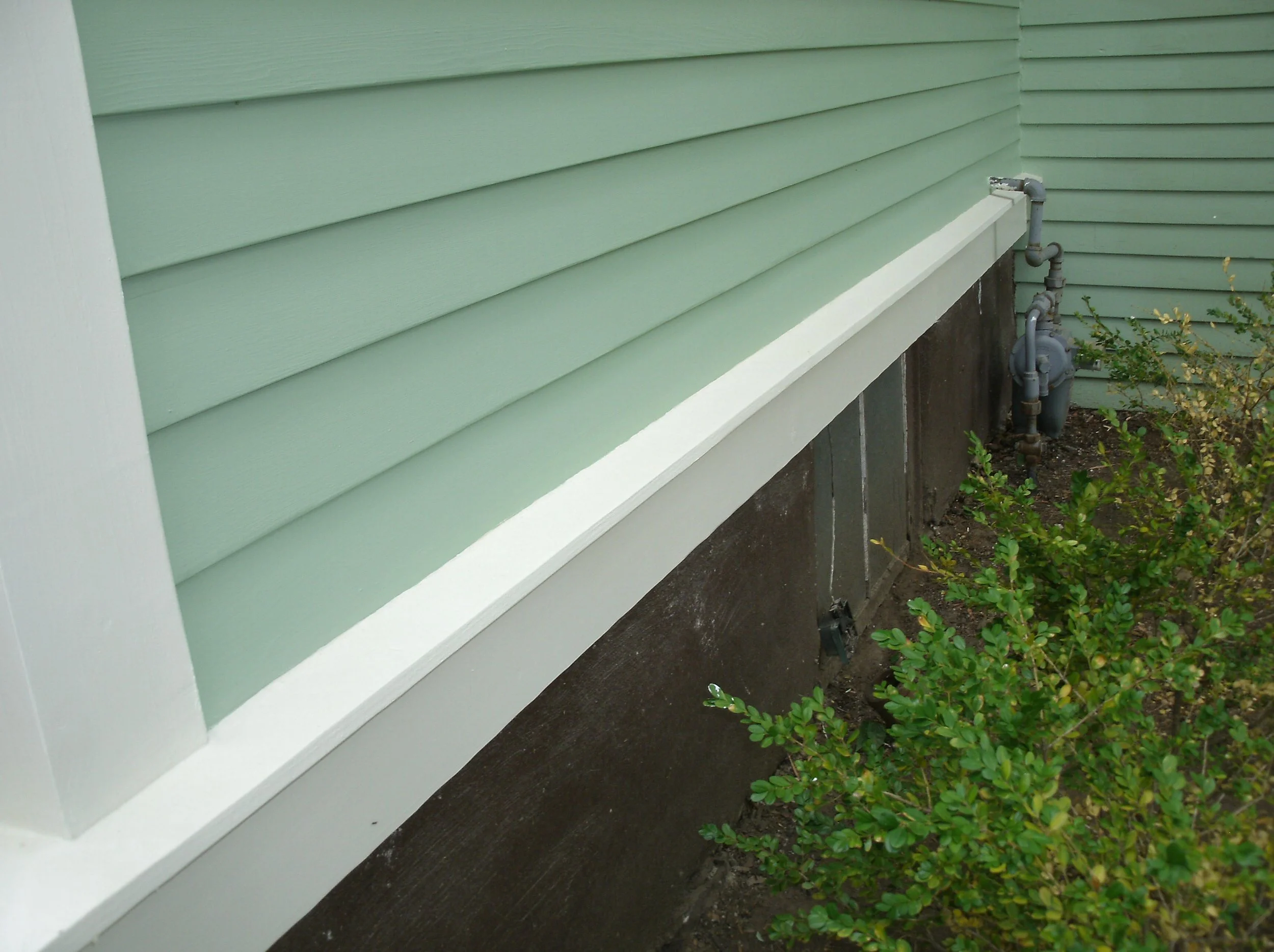 All new wood, including window, trim, and two-part corner trim primed.