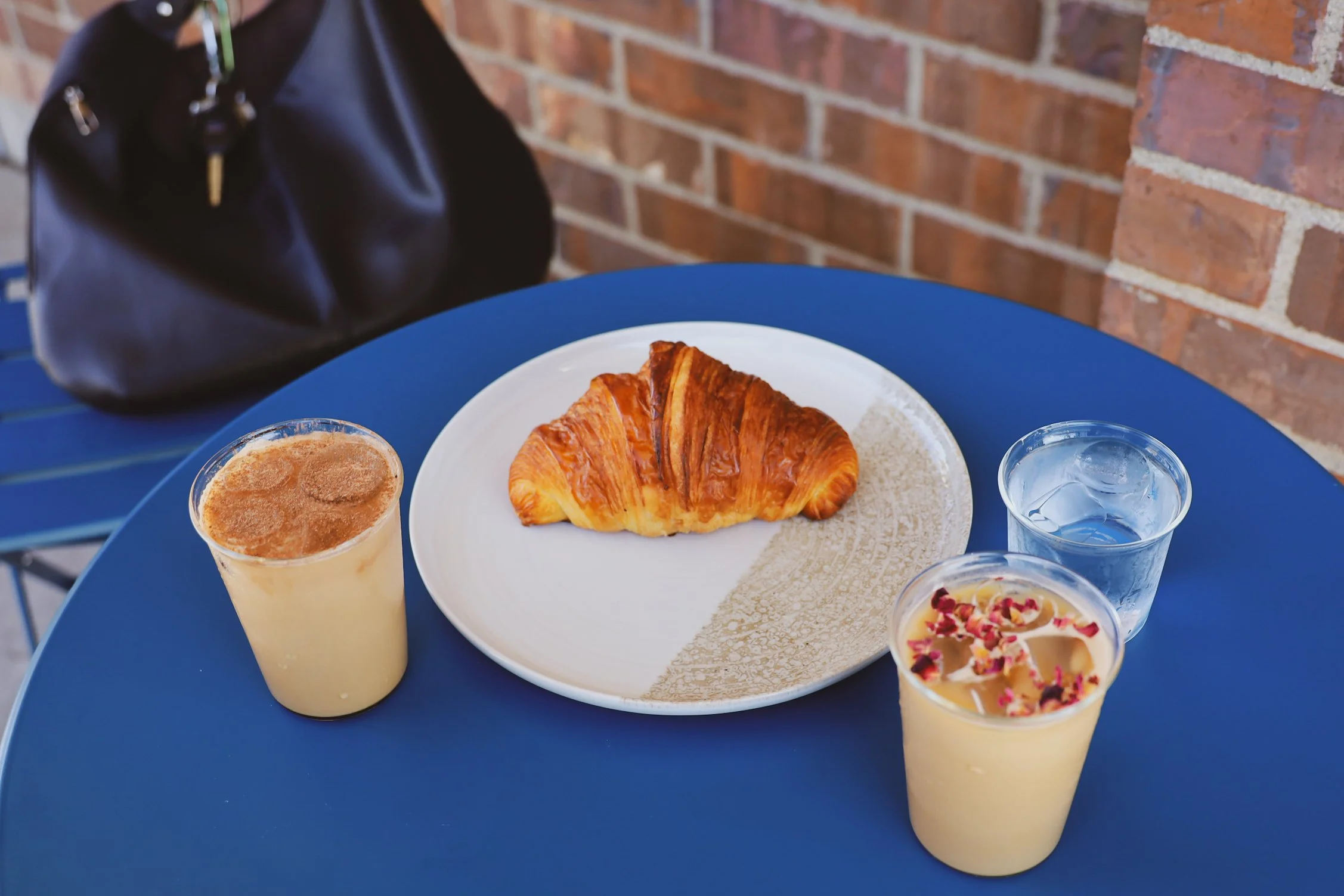 our Sweet Europe latte and Rose Petal latte served iced on a hot day