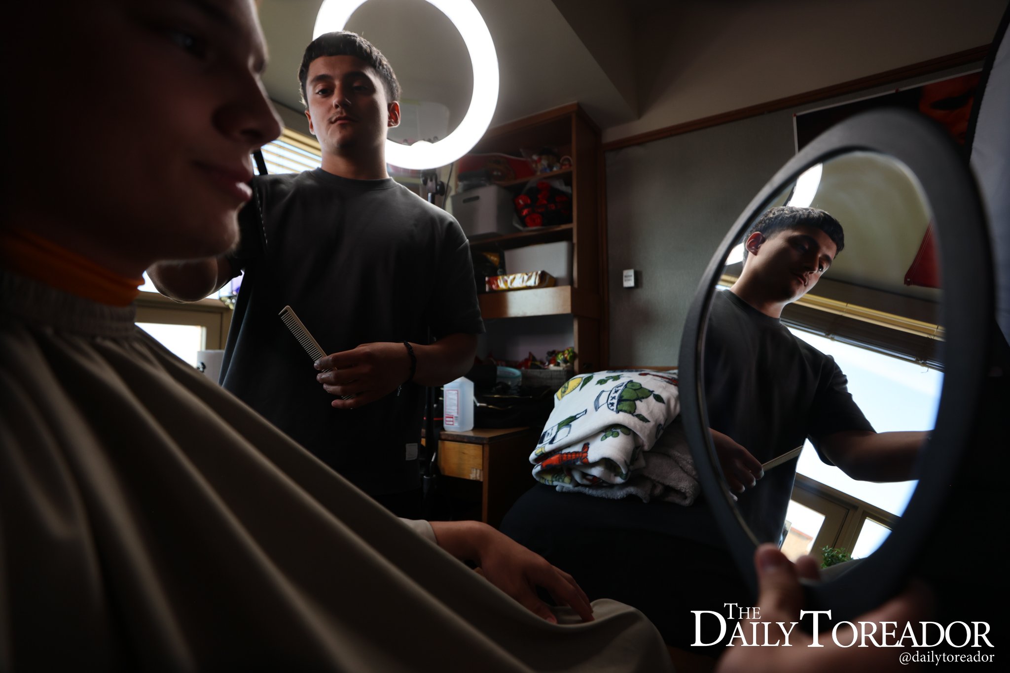 After Aguirre finishes his day, he turns on his razors and flicks on the ring lights inside his dorm and begins cutting the clients of the day.