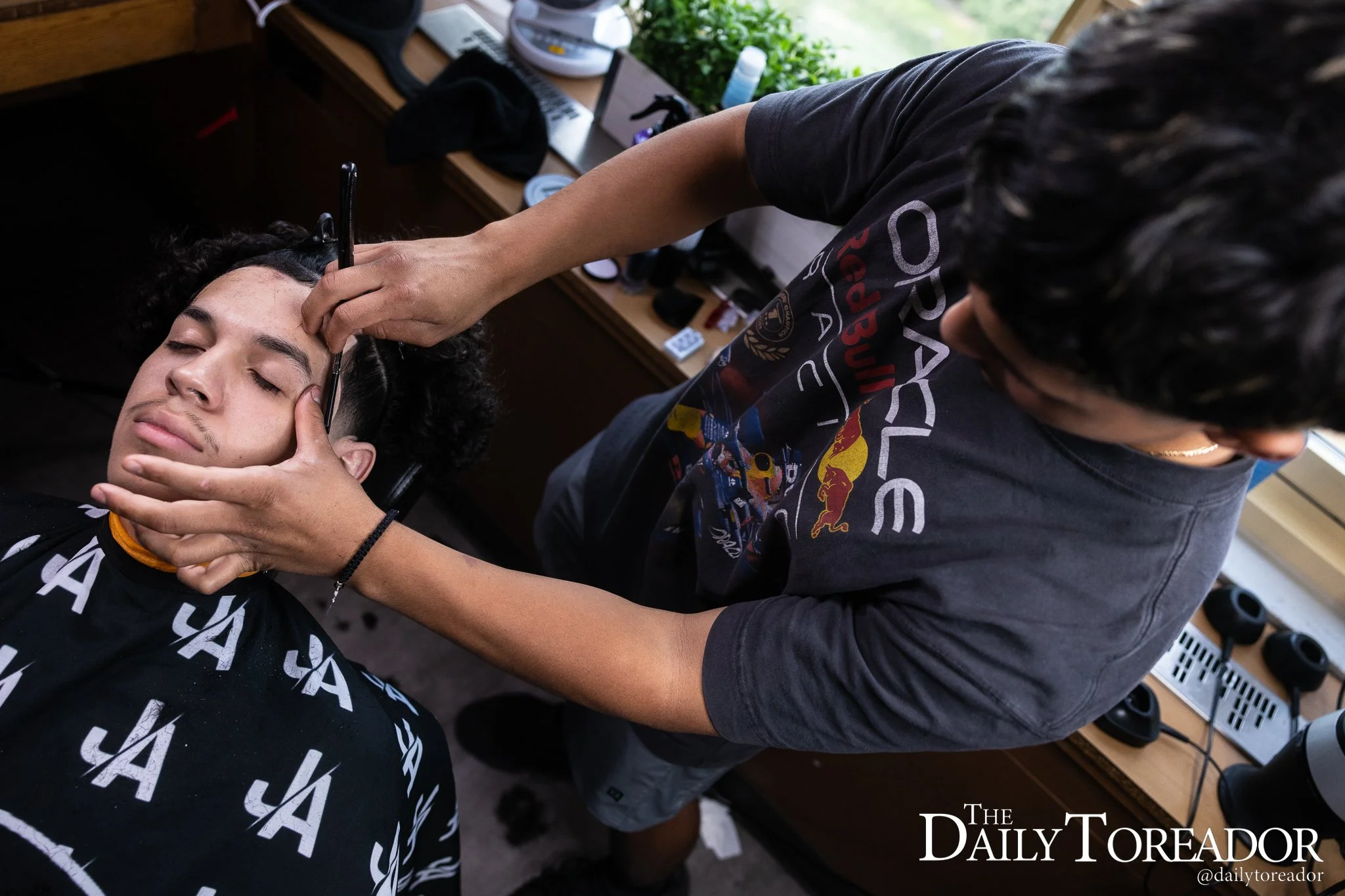 Aguirre prides himself on his small talk while giving fades out to students saying “Sometimes, just go out to get Chick-fil-A, and people go up to me and tell me, ‘Yo, you're that barber on TikTok, right?’ and I'll be like, ‘Yeah.’ Then I tell them t