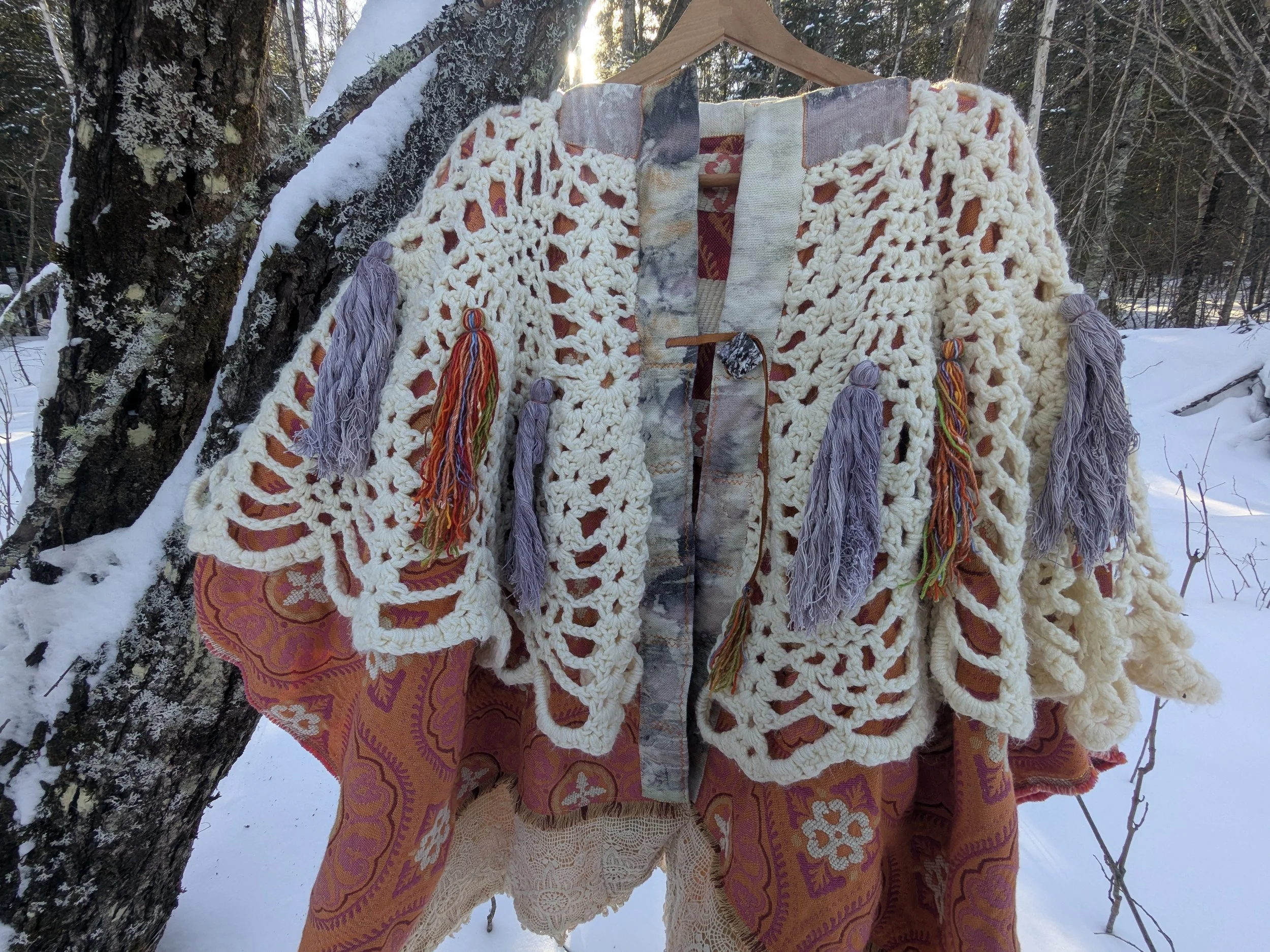 Cozy winter shawl with fully upcycled fabric, front view.
