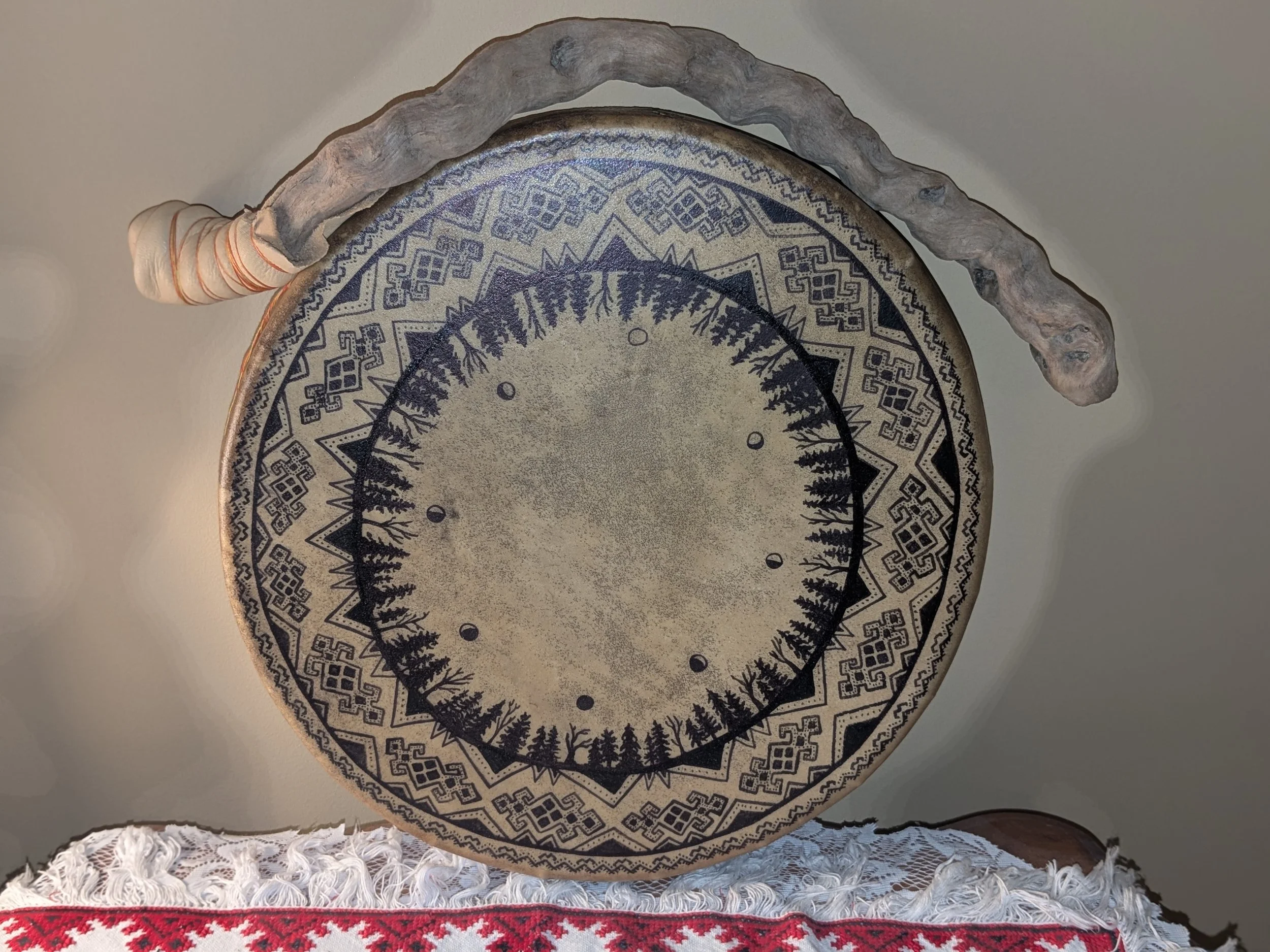 Adornment for your drum with personalized ancestral symbols, free-hand design with permanent ink.