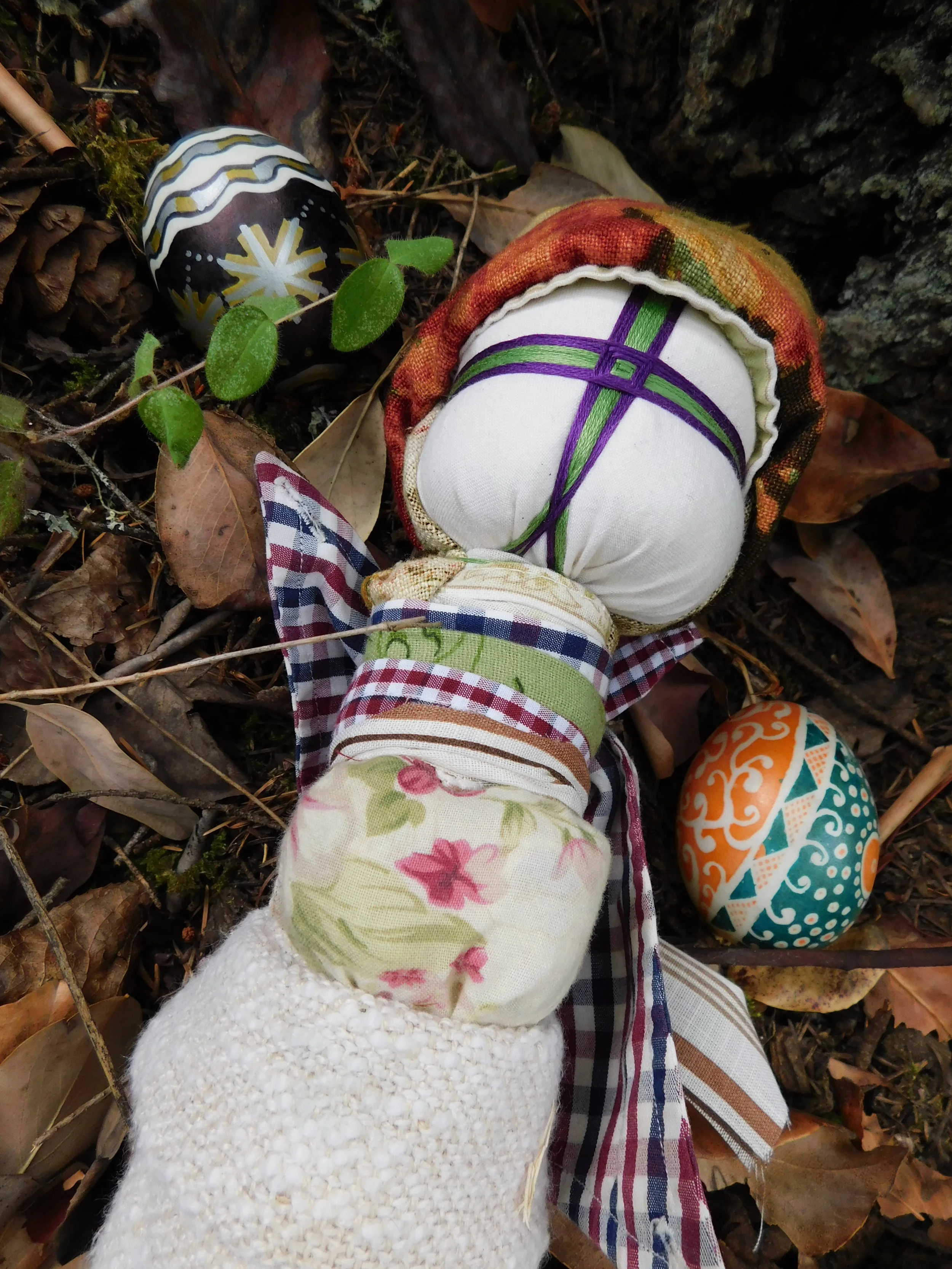 Motanka and Pysanky for land ceremony.
