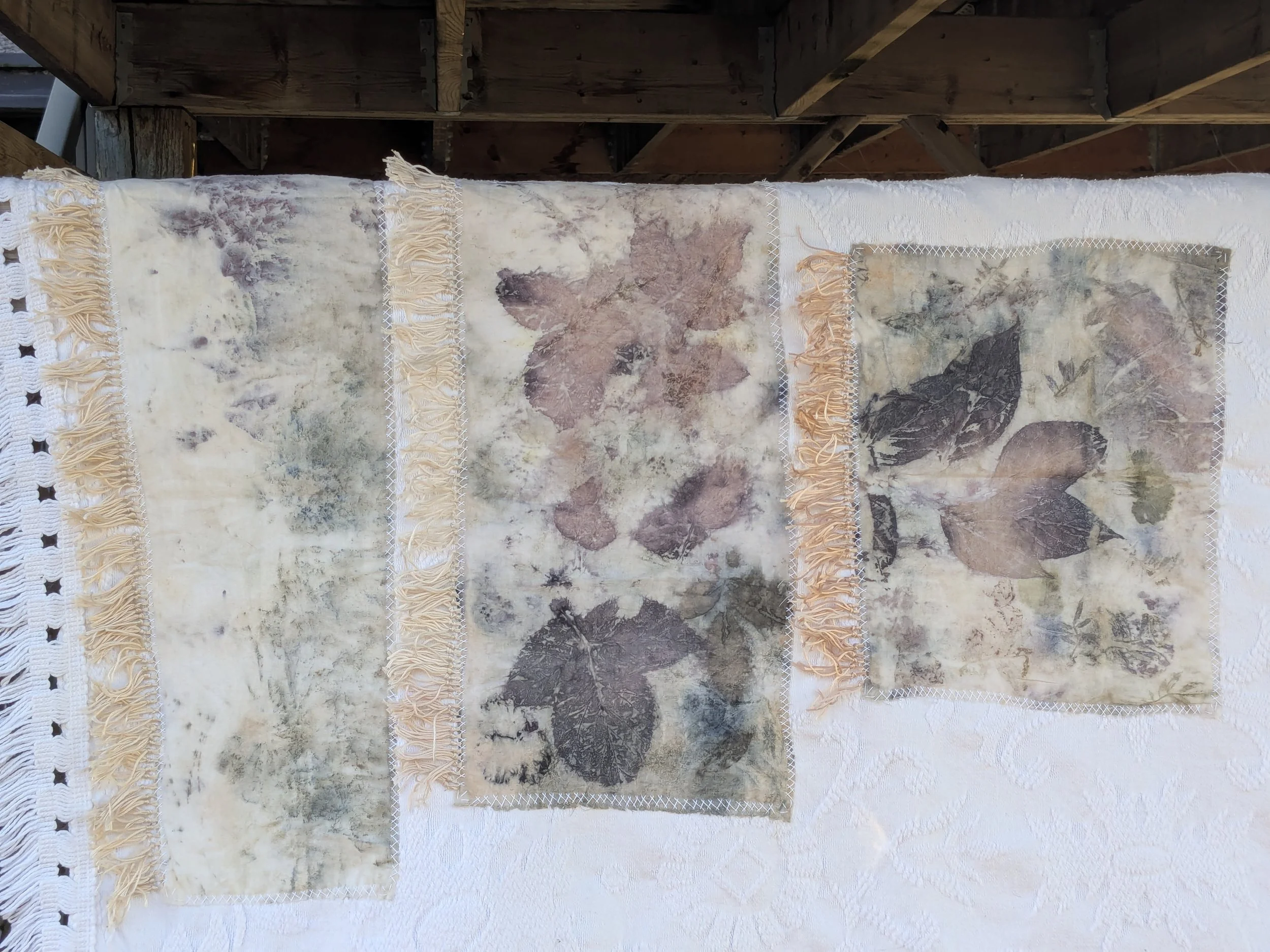 Spring cozy throw shawl made of upcycled white blanket and ecoprint panels.