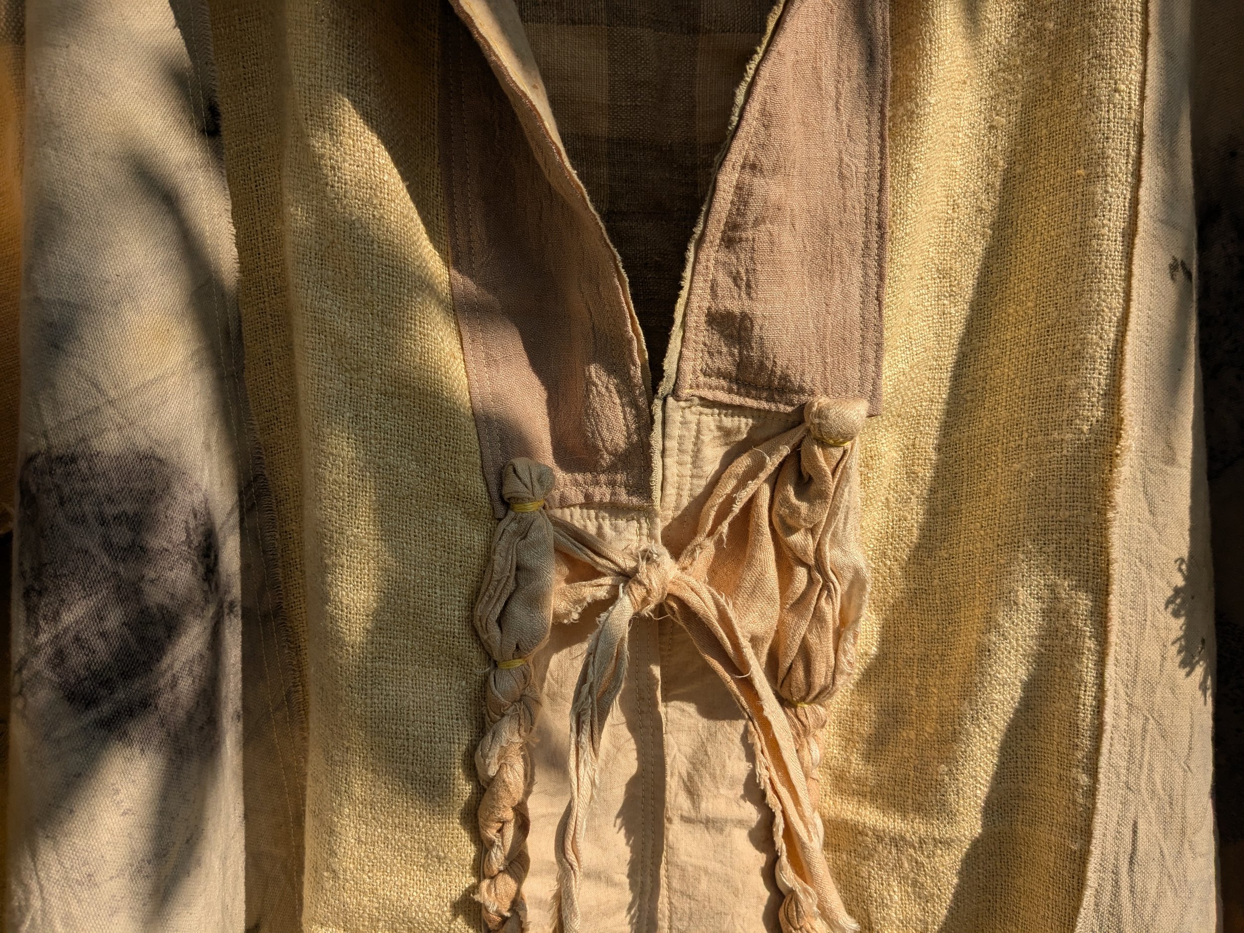 Handcrafted ceremonial shawl, linen and cotton with naturally dyed and eco-printed panels.  Clasp details.