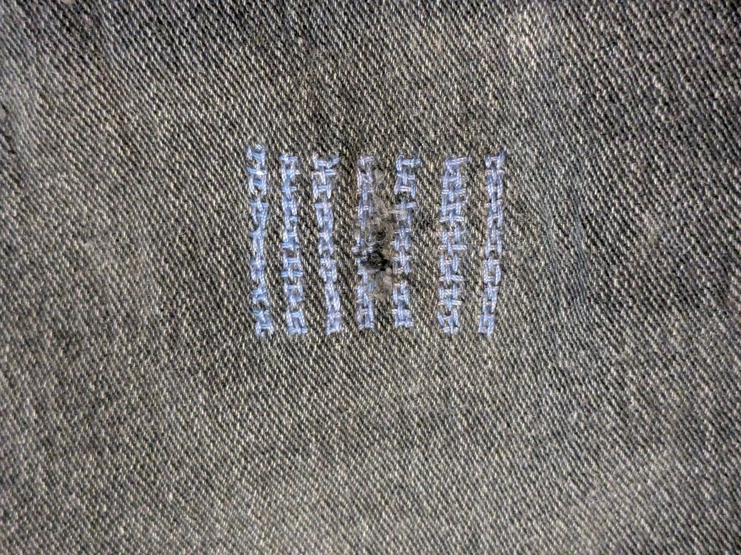 Mending of hole and reinforing fabric of jeans.