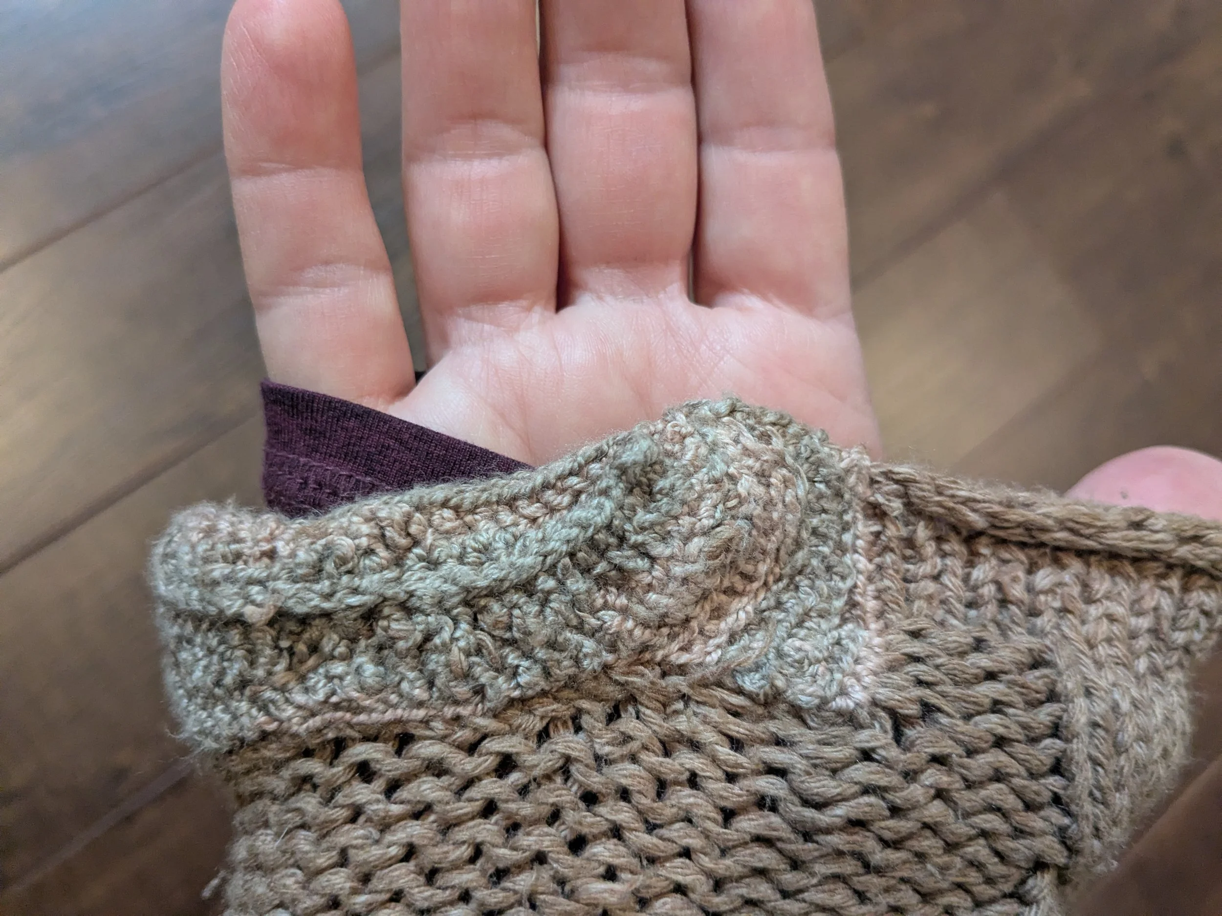 Repaired visible mending using crochet.