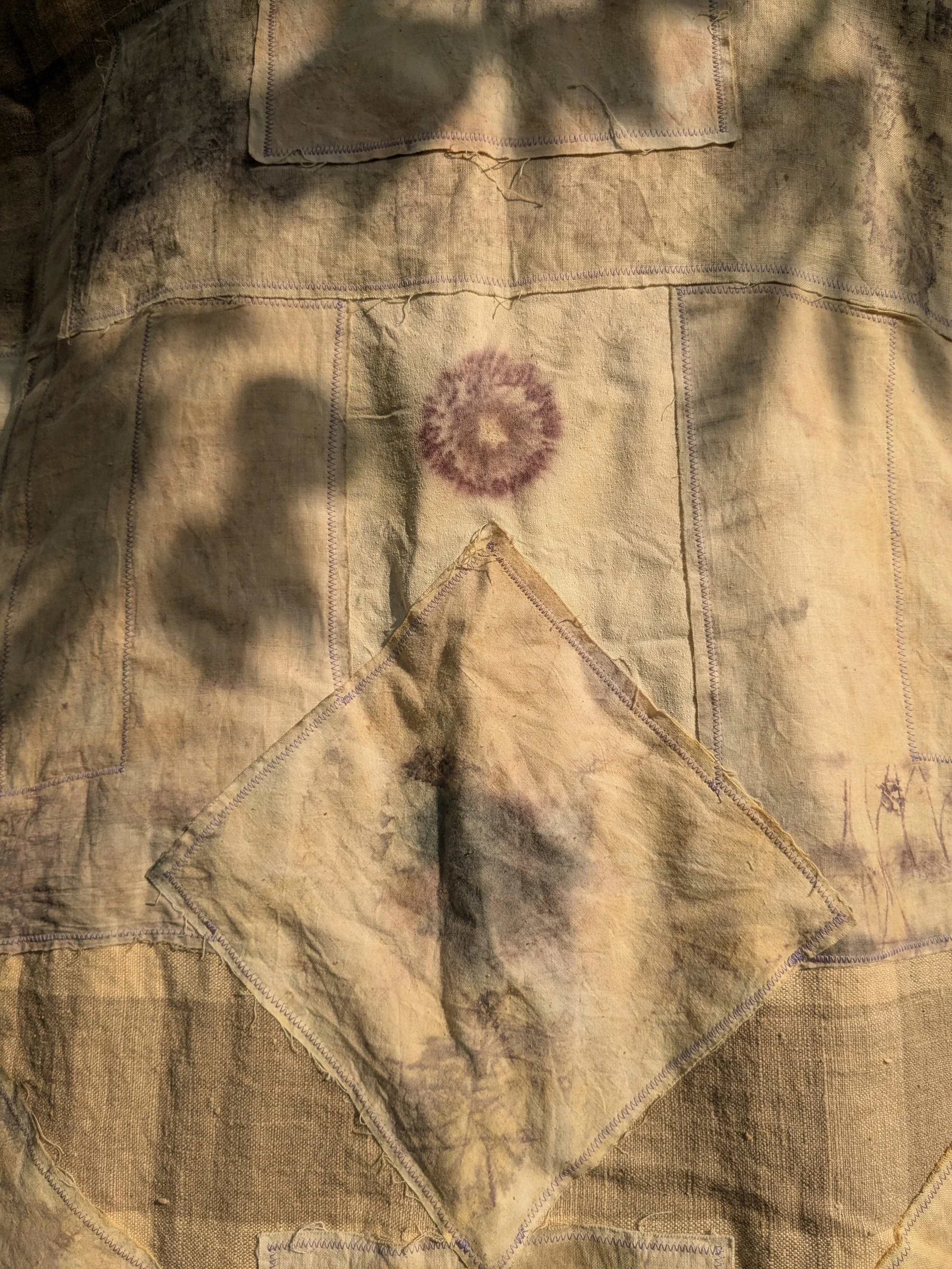 Handcrafted ceremonial shawl, linen and cotton with naturally dyed and eco-printed panels.  Sunflower eco-print up close.