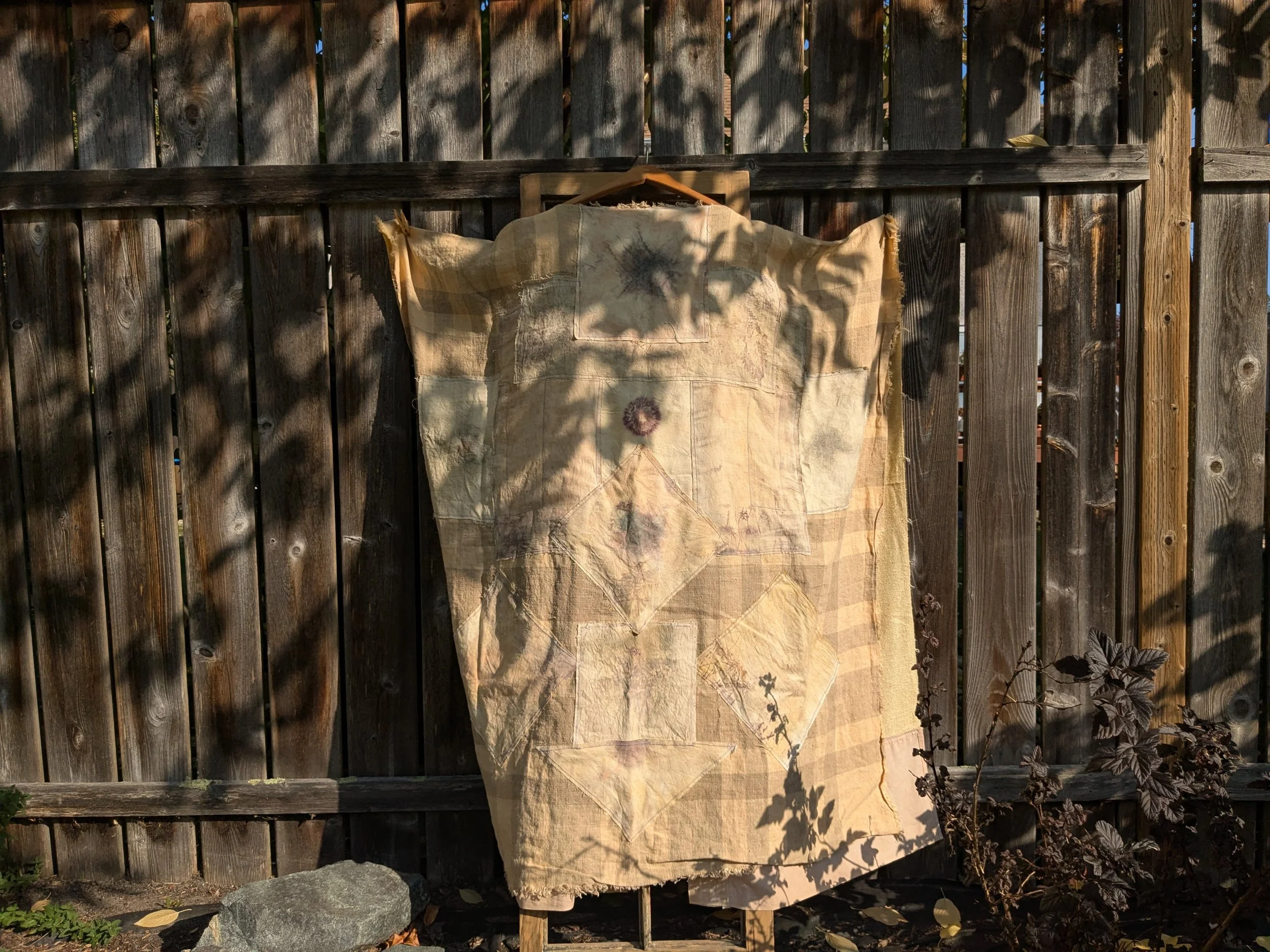 Handcrafted ceremonial shawl, linen and cotton with naturally dyed and eco-printed panels.  Back view.