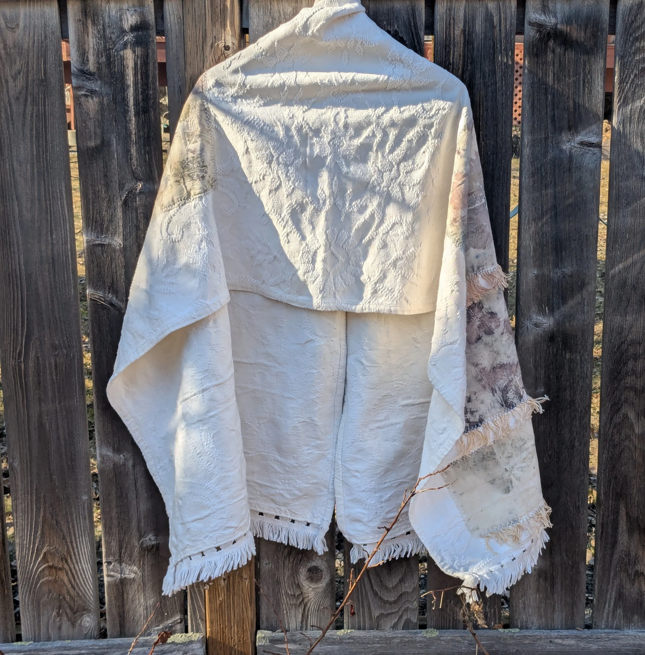Spring cozy throw shawl made of upcycled white blanket and ecoprint panels.