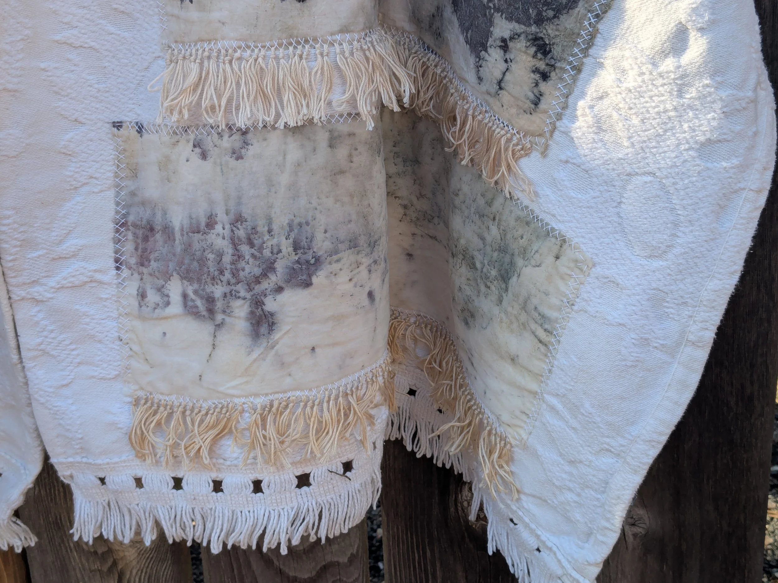 Spring cozy throw shawl made of upcycled white blanket and ecoprint panels.