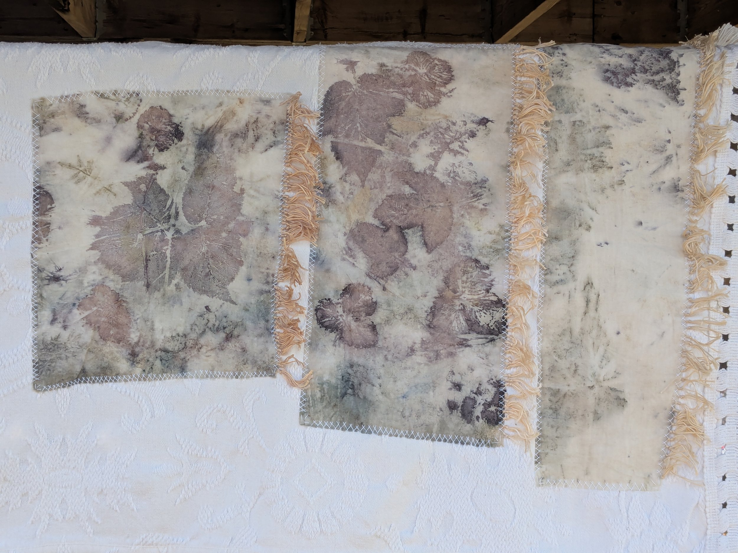 Spring cozy throw shawl made of upcycled white blanket and ecoprint panels.