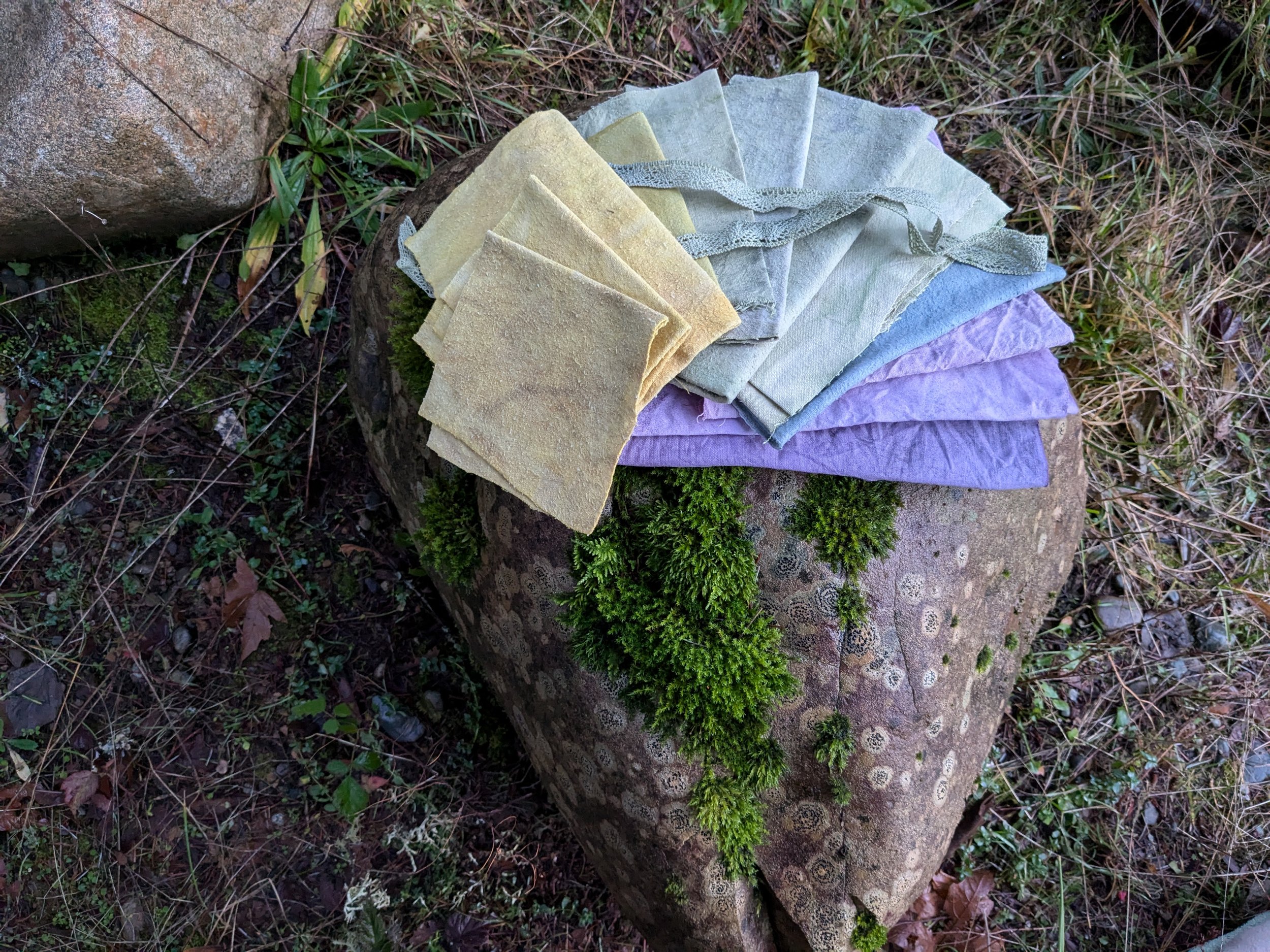 Array of colours and swatches, naturally dyed upcycled fabric.