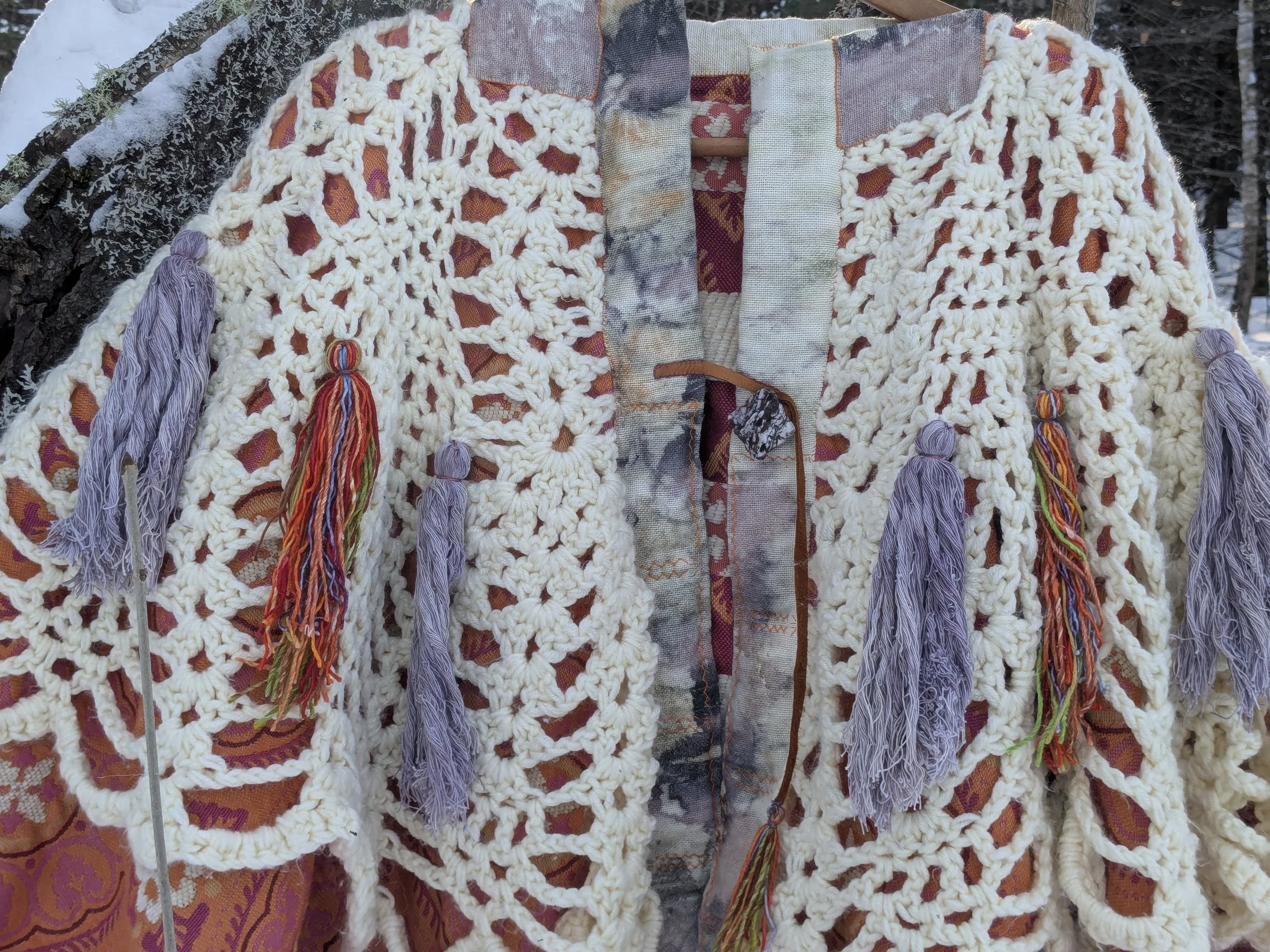 Cozy winter shawl with fully upcycled fabric, close-up, front view.