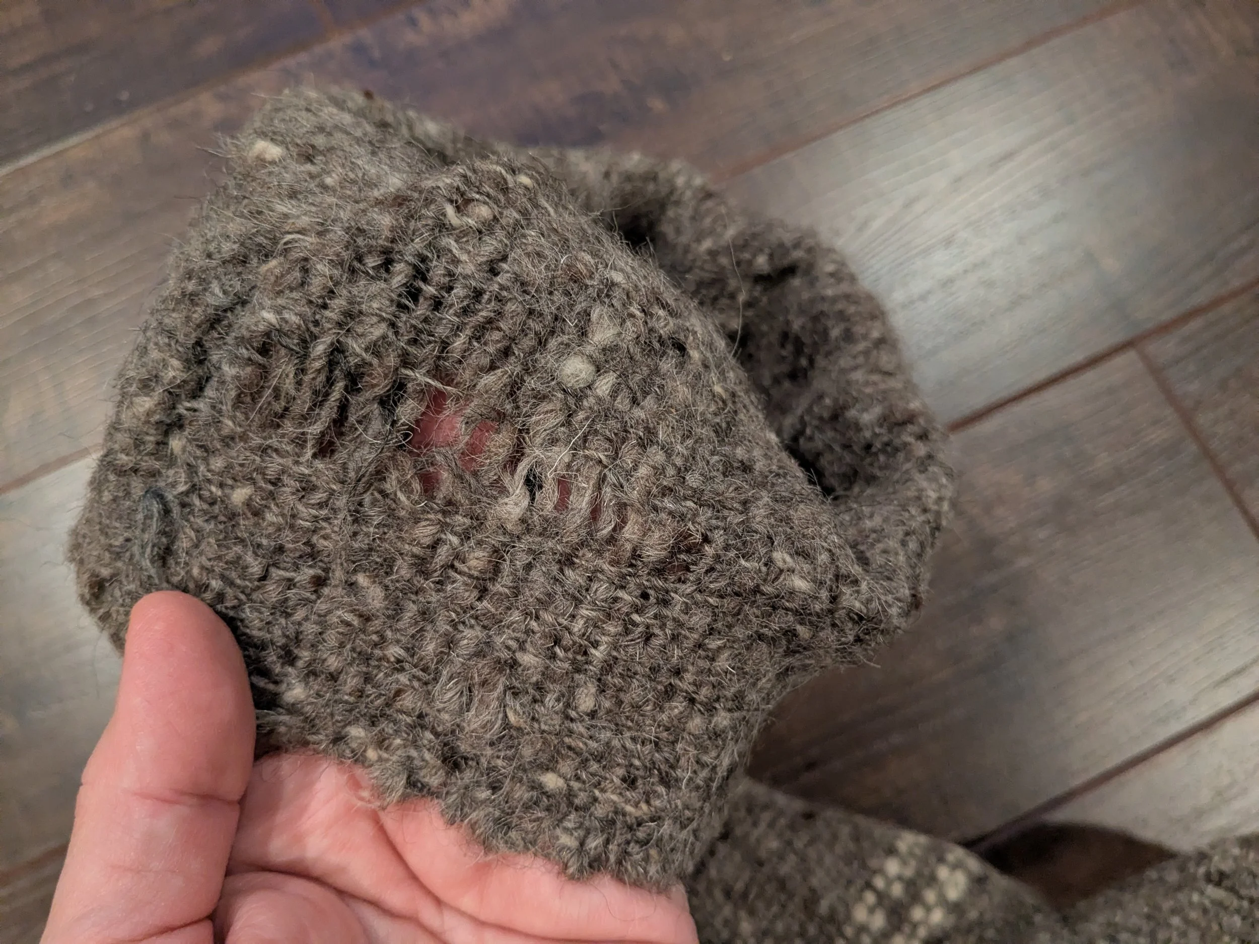 Before, worn wool sleeve.