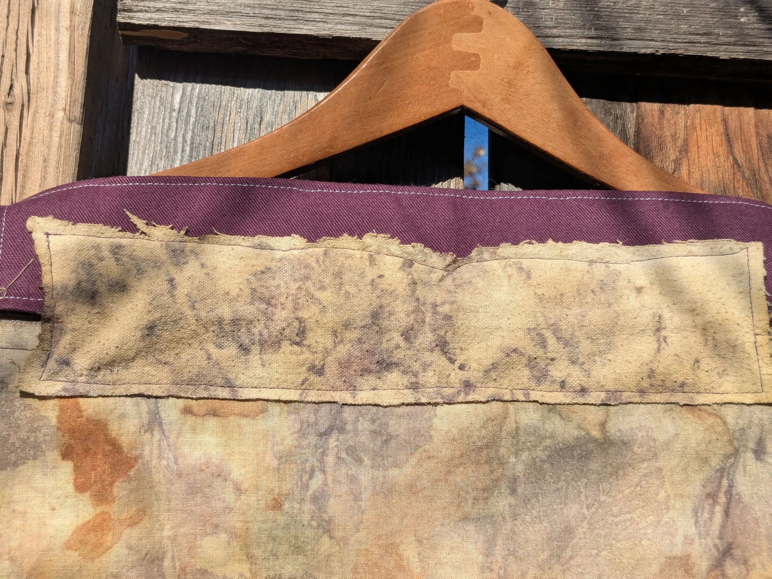 Autumn shawl with eco-printed panels and upcylced fabric and notions.