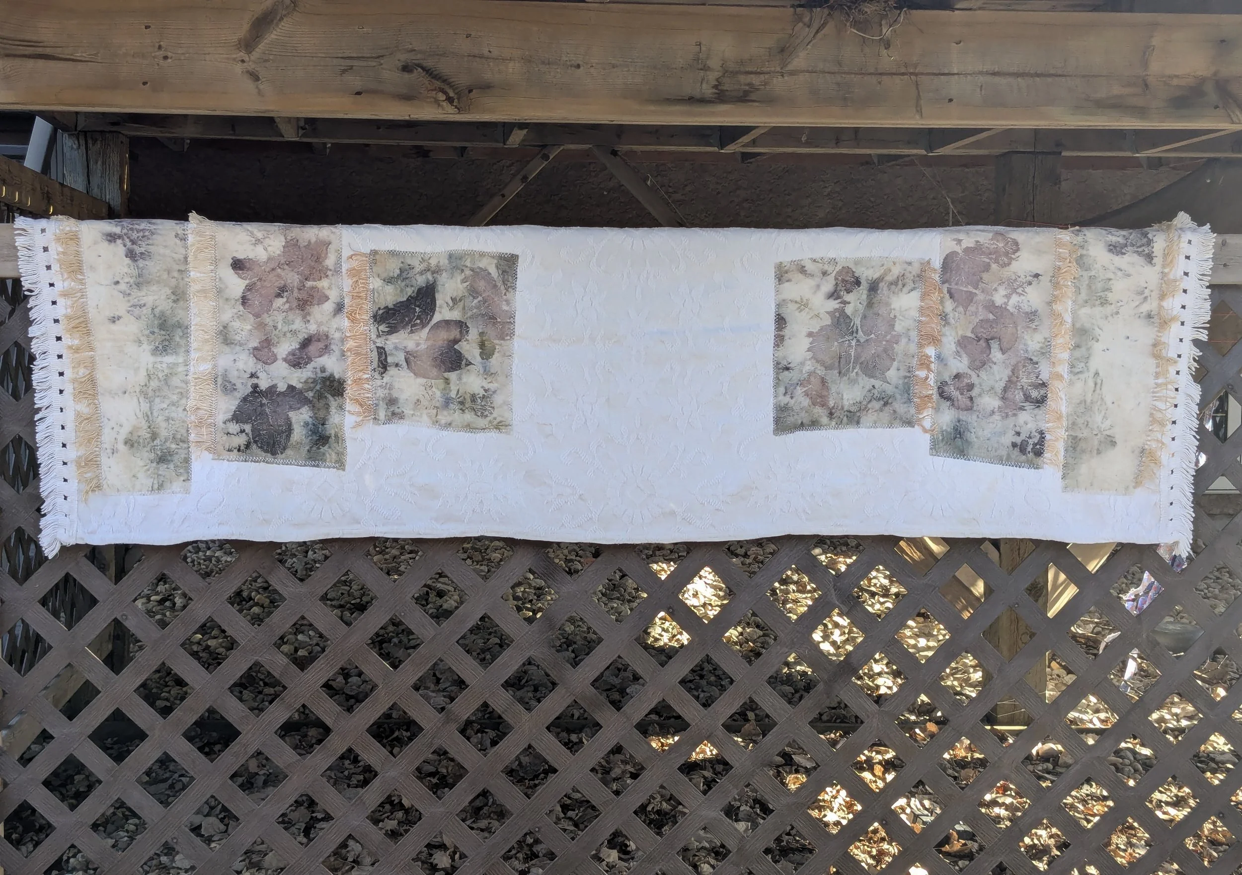 Spring cozy throw shawl made of upcycled white blanket and ecoprint panels.