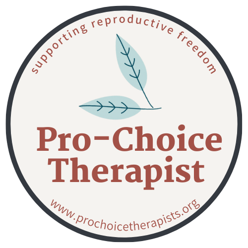 Circular logo for Pro-Choice Therapist with two blue leaves and surrounding text that reads supporting reproductive freedom and the website www.prochoicetherapists.org.