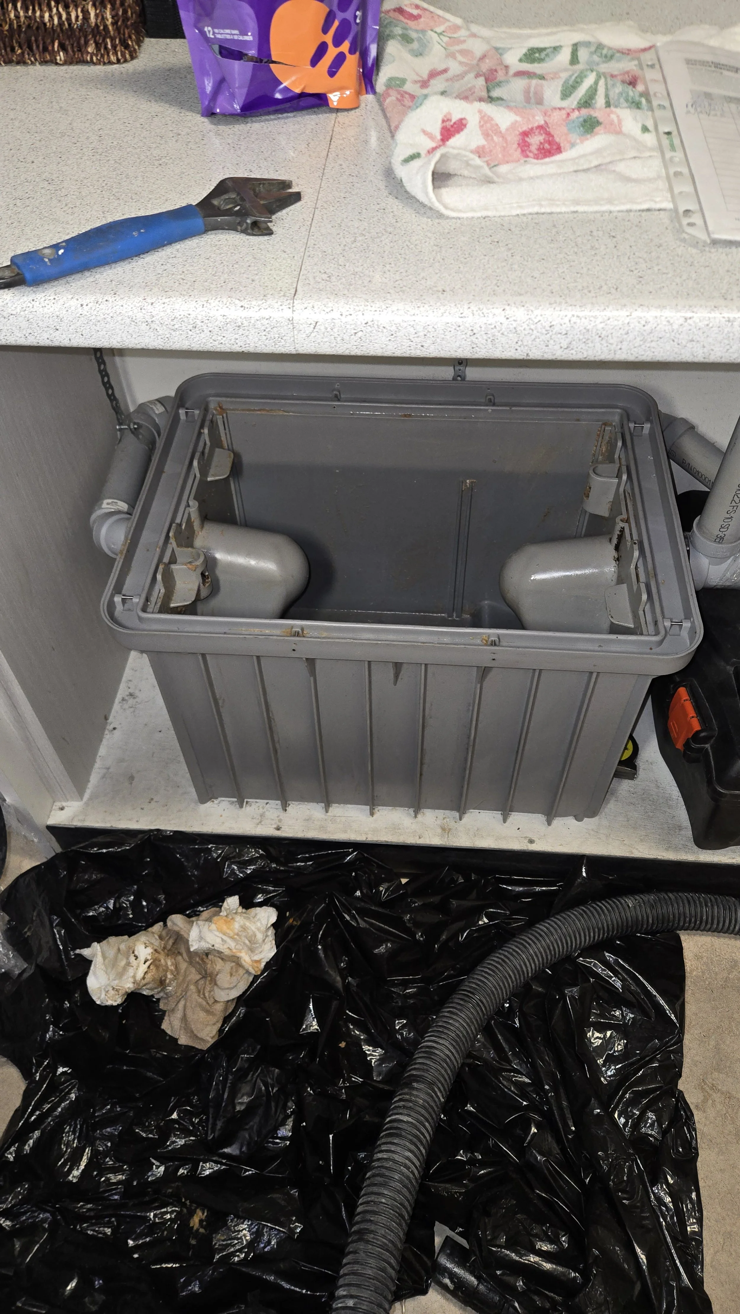 Greas trap cleaned out and repaired.