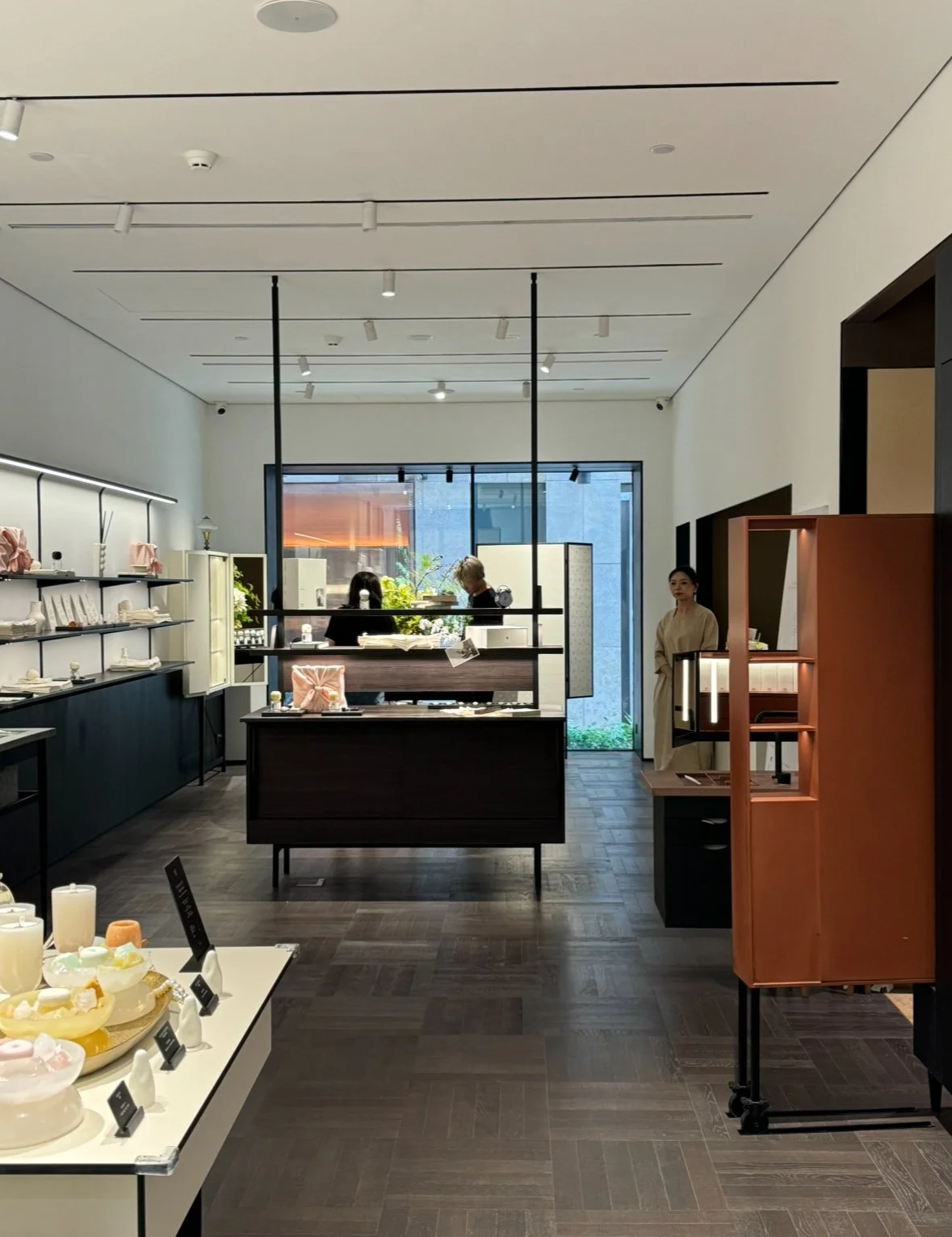 Interior view of To Summer's store at the Bund, Shanghai, with Ming-Qing Dynasty style furniture in an elegantly illuminated space.