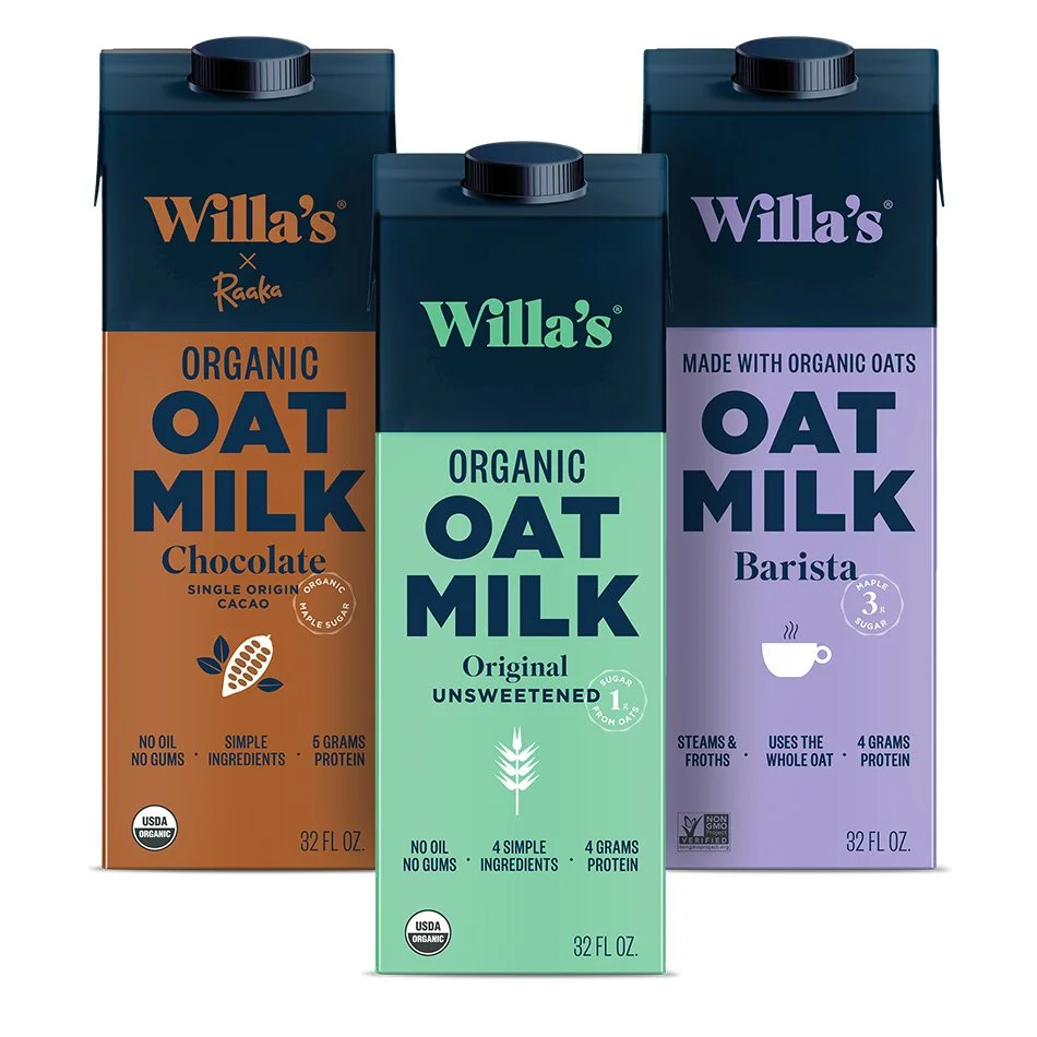 Three cartons of Willa's organic oat milk in different flavors: Chocolate, Original Unsweetened, and Barista. Each carton features unique benefits like no gums, simple ingredients, and varying protein content. USDA Organic certification shown.