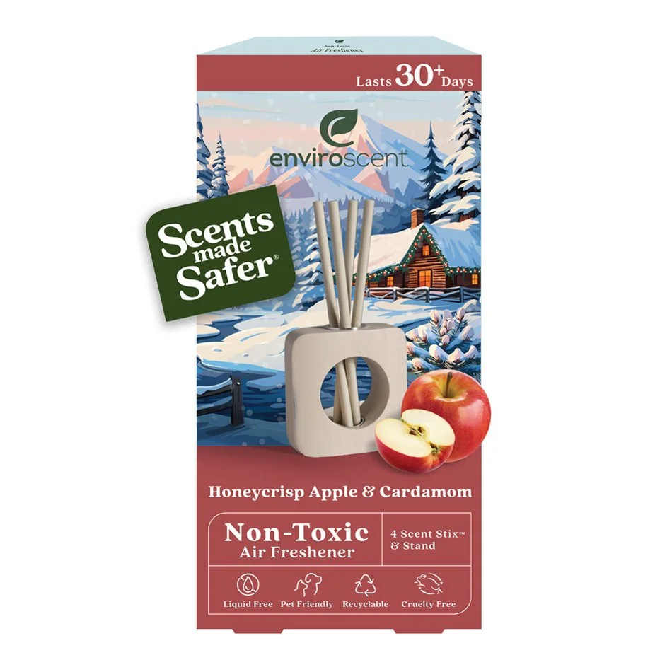 EnviroScent Honeycrisp Apple & Cardamom non-toxic air freshener package with scenic winter background, featuring sticks and an apple illustration. Made for lasting over 30 days, it is liquid free, pet friendly, recyclable, and cruelty free.