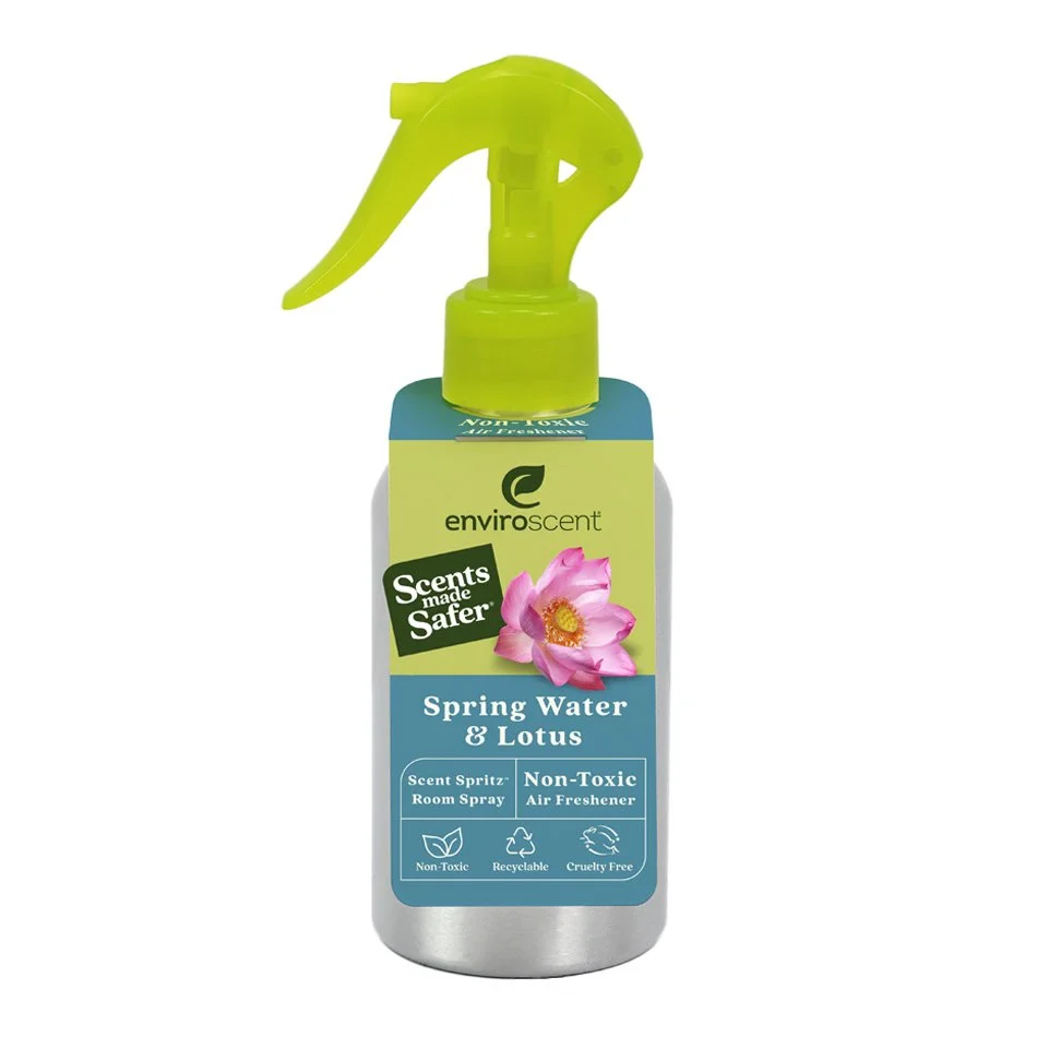 A bottle of Enviroscent Spring Water & Lotus room spray with a green nozzle. The label highlights it as a non-toxic, recyclable, and cruelty-free air freshener.